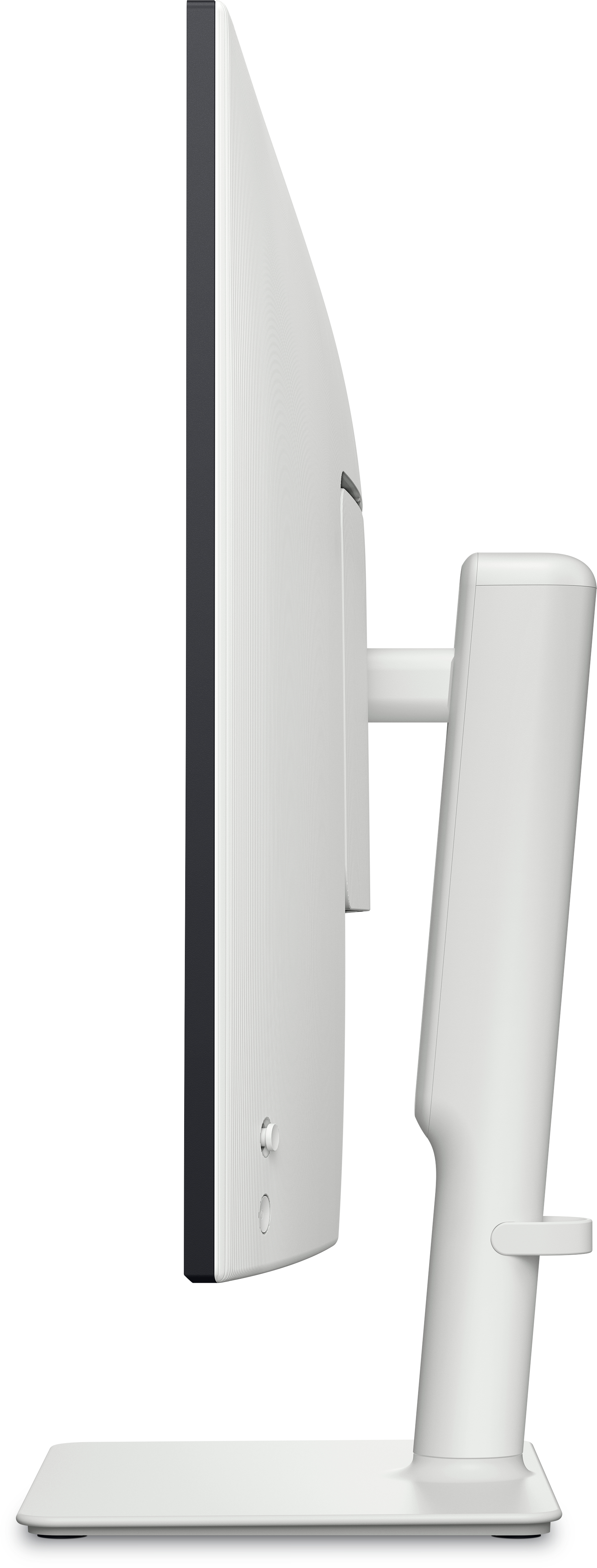 Widok z boku białego monitora z białą podstawą, białe tło.