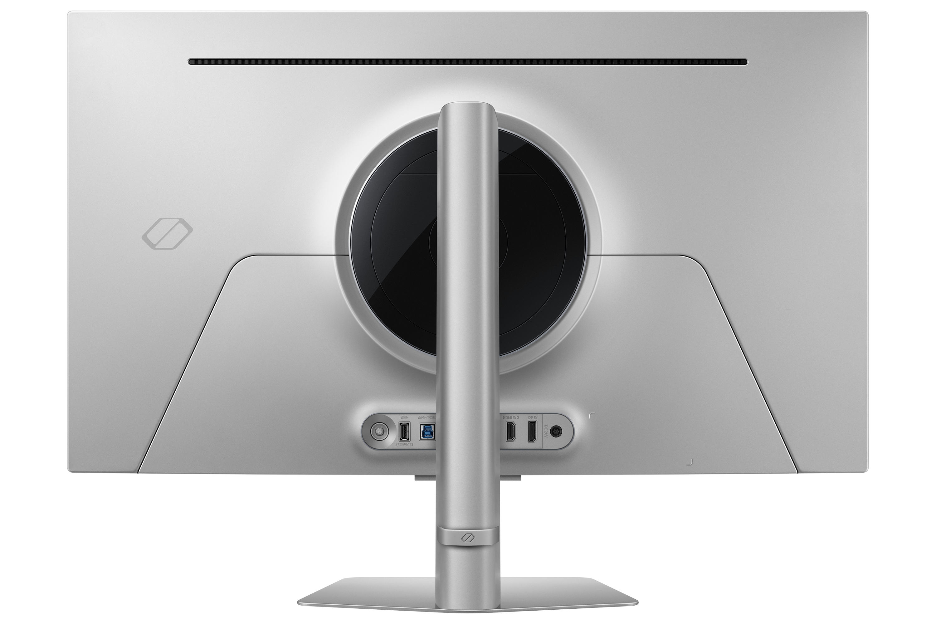 Die Rückseite eines silbernen Computermonitors mit Anschlüssen und einem kreisförmigen schwarzen Design.