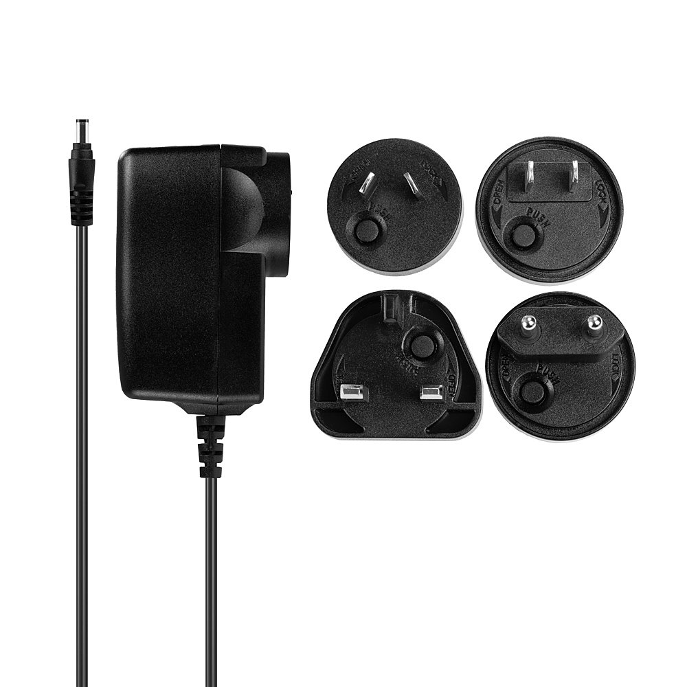 Czarny zasilacz z wieloma adapterami wtyczek i czarnym kablem.