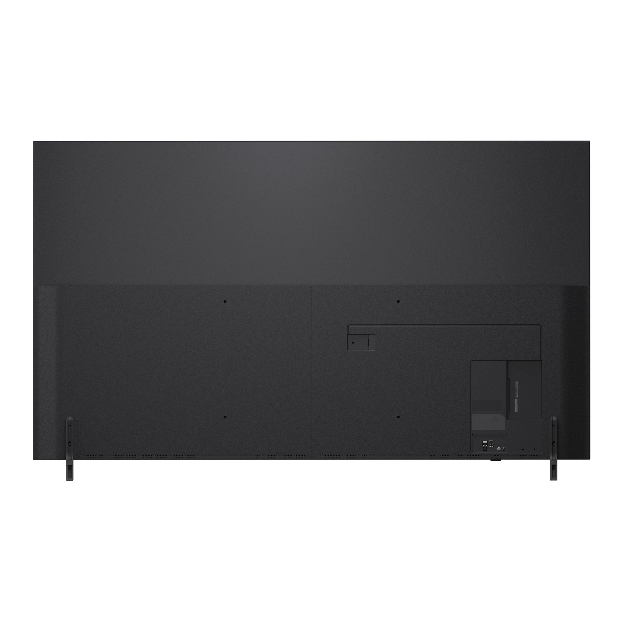 Tył czarnego telewizora z widocznymi portami i podporami.