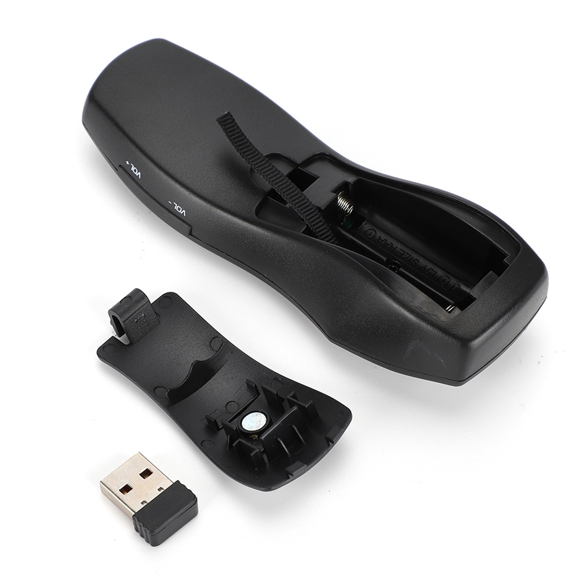 Schwarze Fernbedienung mit offenem Batteriefach und USB-Empfänger.