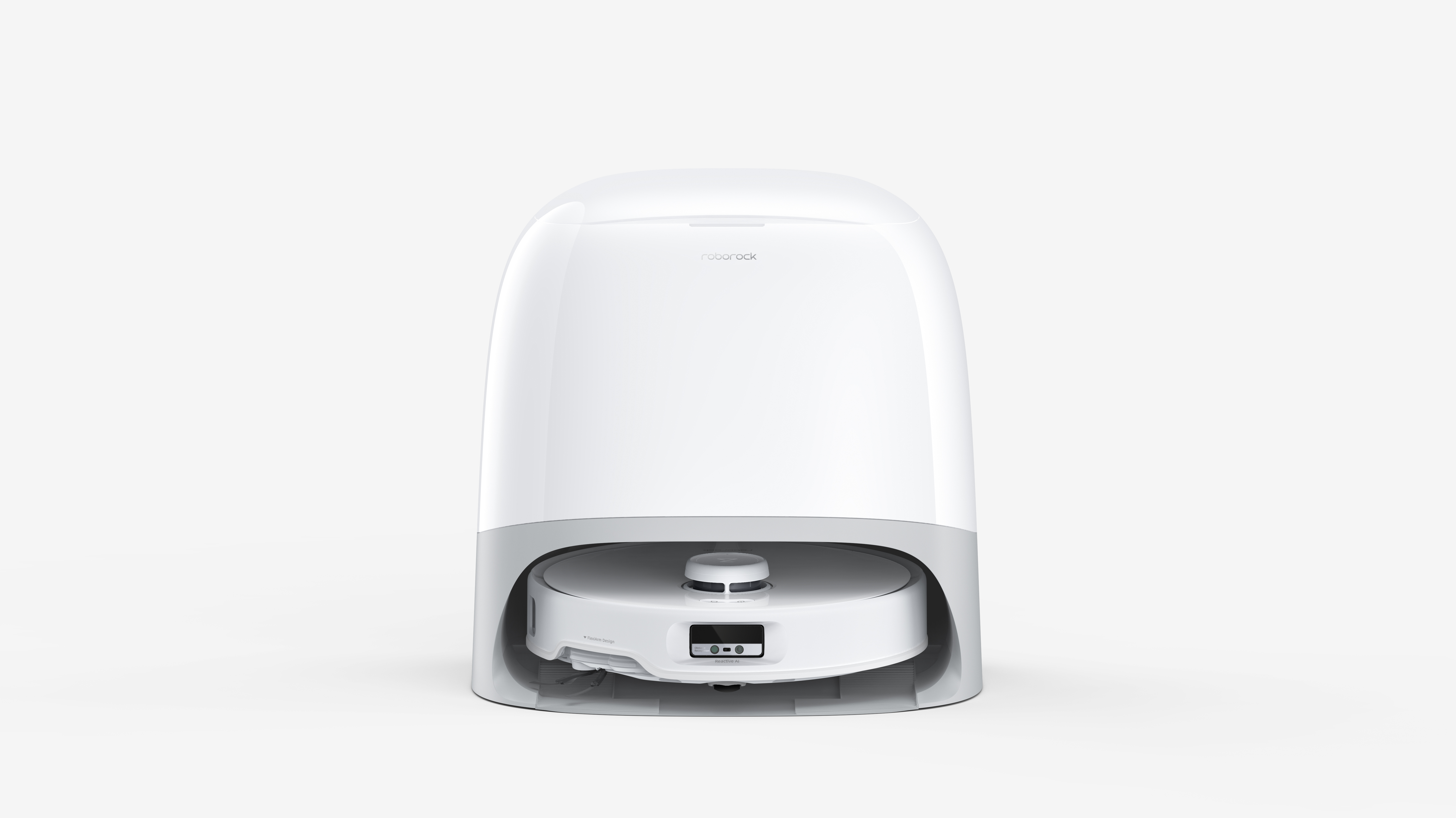 Biały odkurzacz automatyczny w stacji ładującej. Oba są białe i szare.