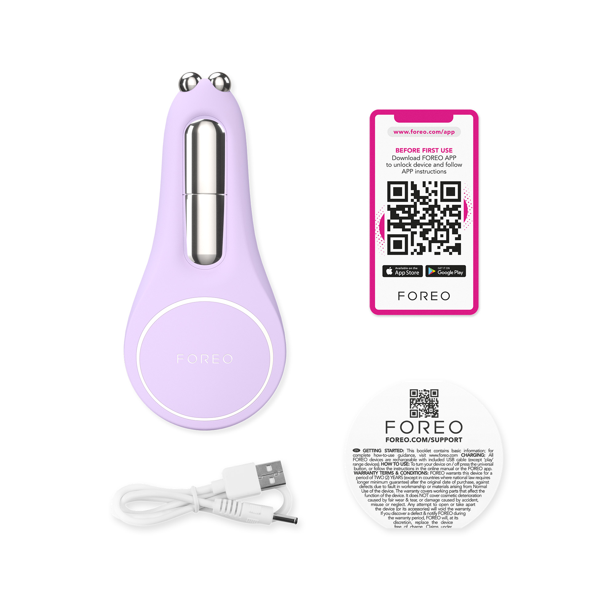 A purple facial device with a charging cable and a Foreo instruction card.