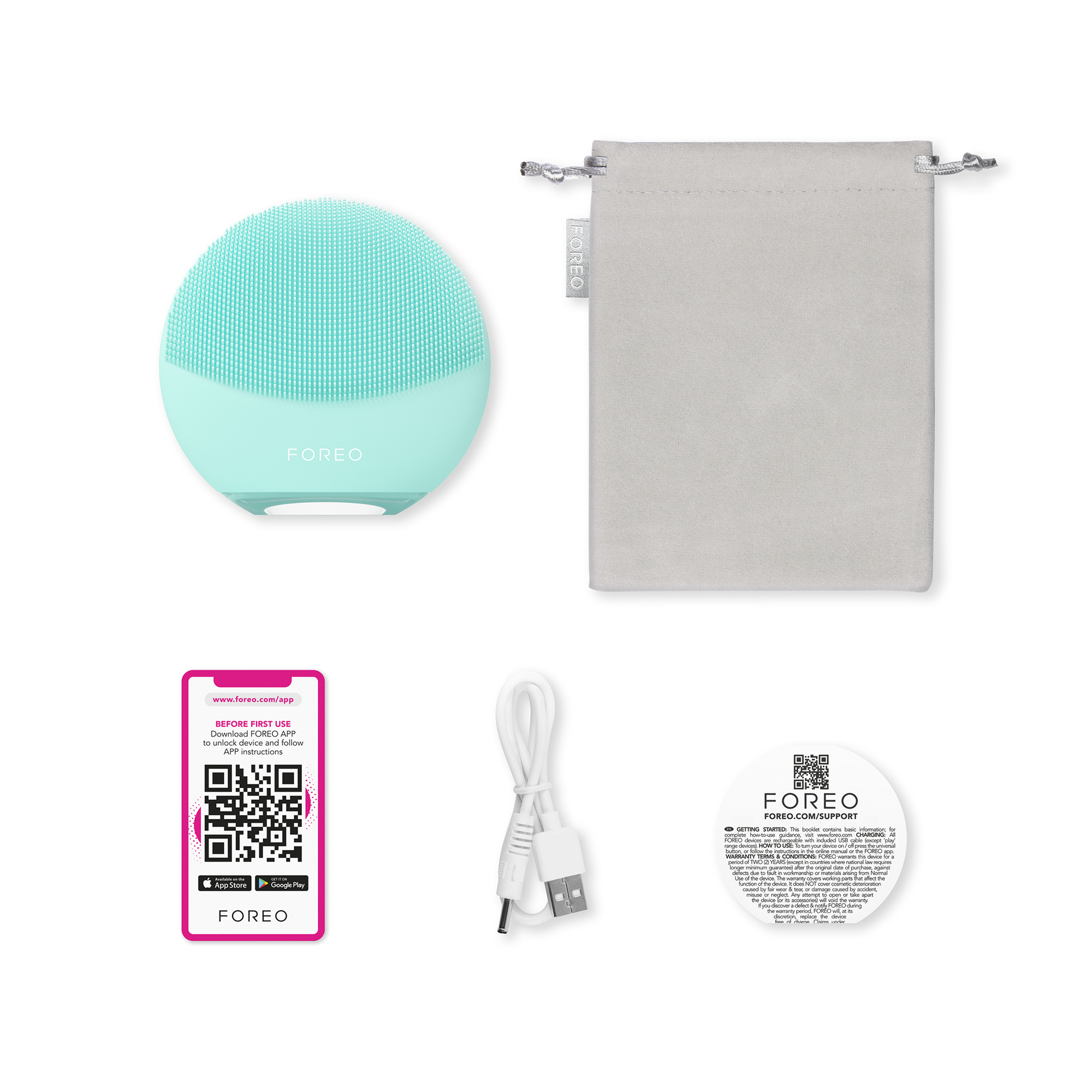Teal facial cleansing device with a pouch, charging cable, and instructions.
