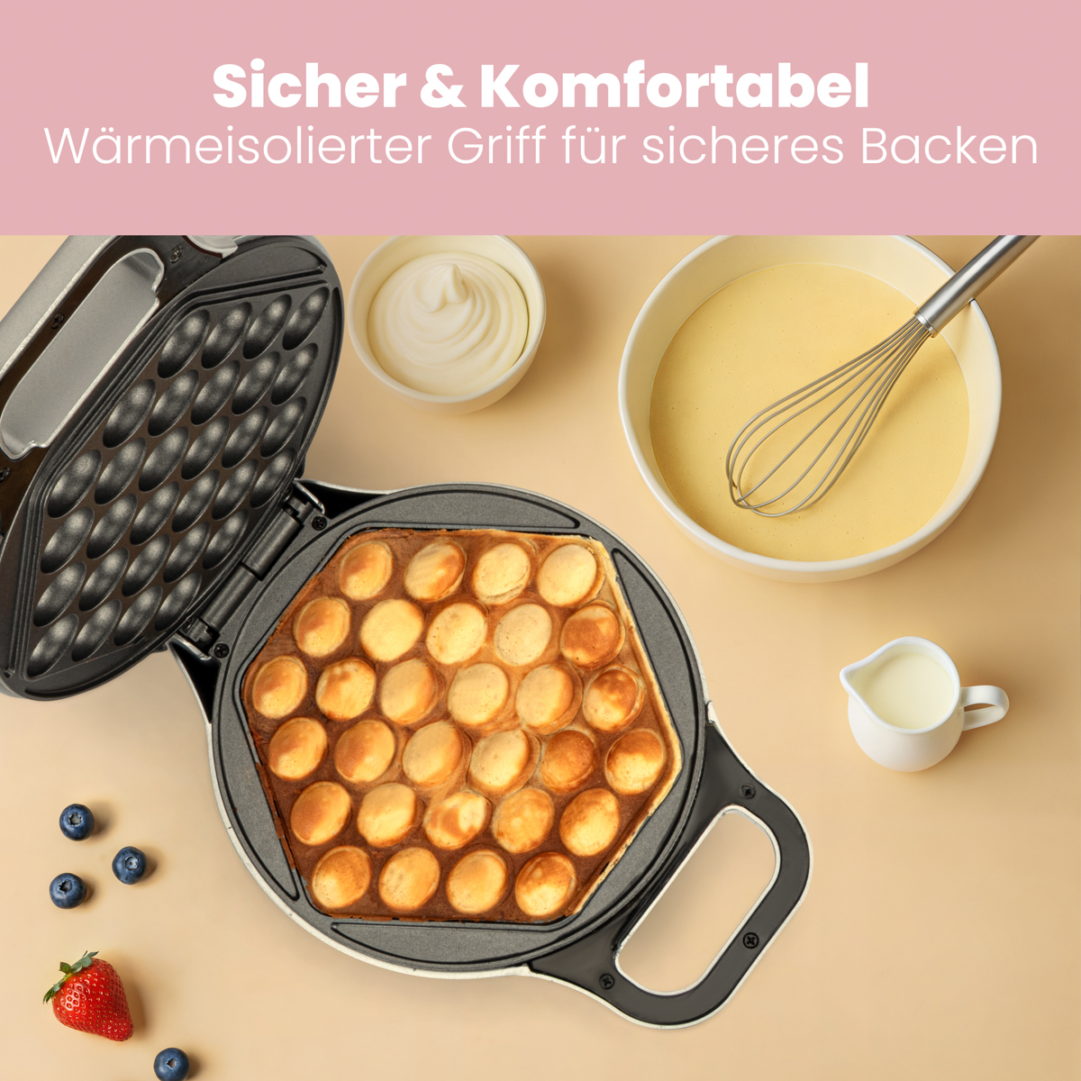 Gofrownica z ugotowanymi goframi, składnikami i tekstem w języku niemieckim. Różowe i białe tło.