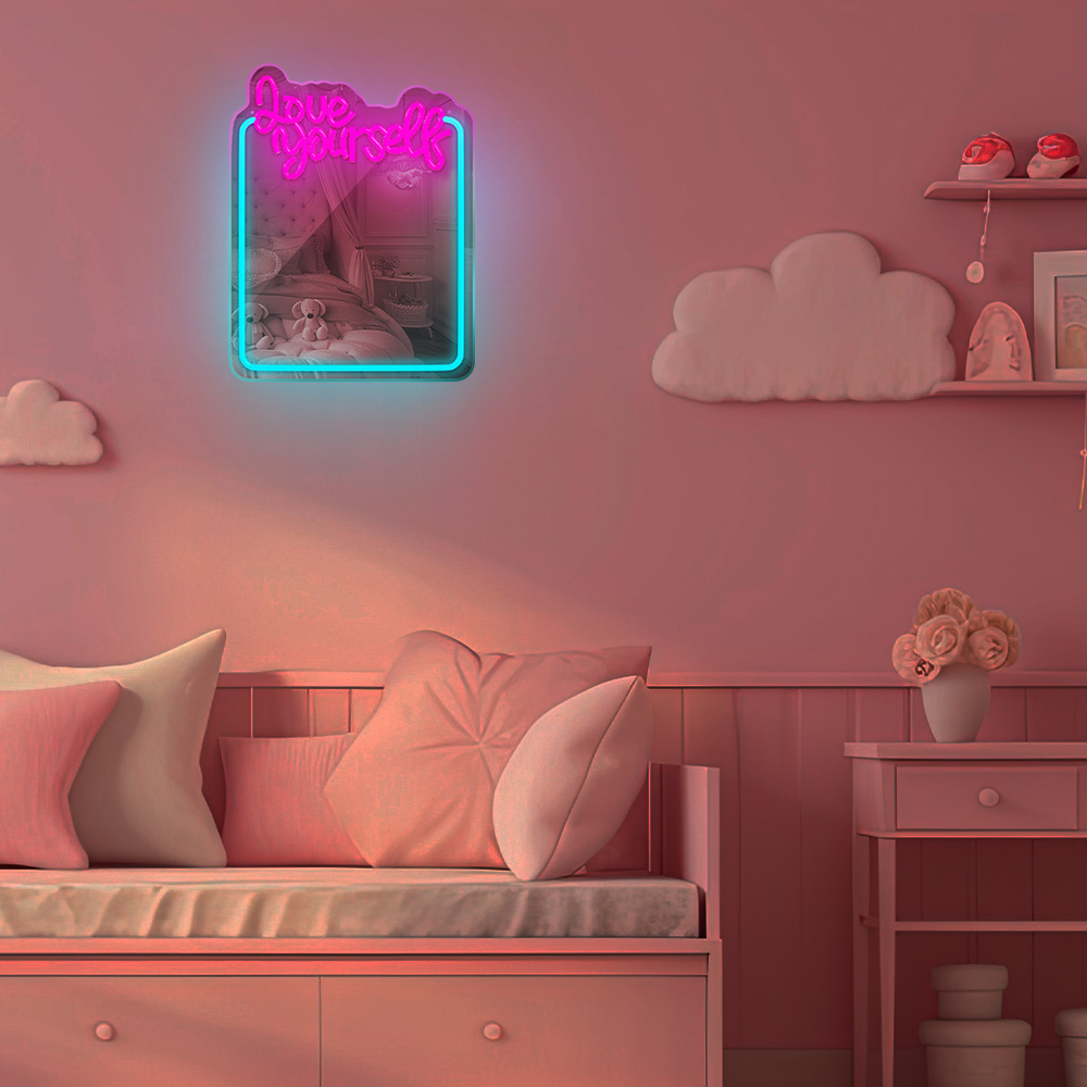 Letrero de neón con Love Yourself en un dormitorio de temática rosa, con una cama rosa.