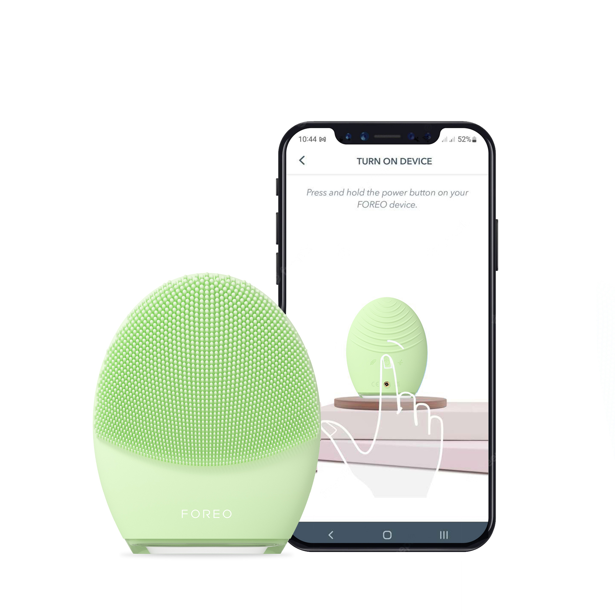 Gezichtsreinigingsapparaat en een telefoonscherm met het apparaat en een tutorial.