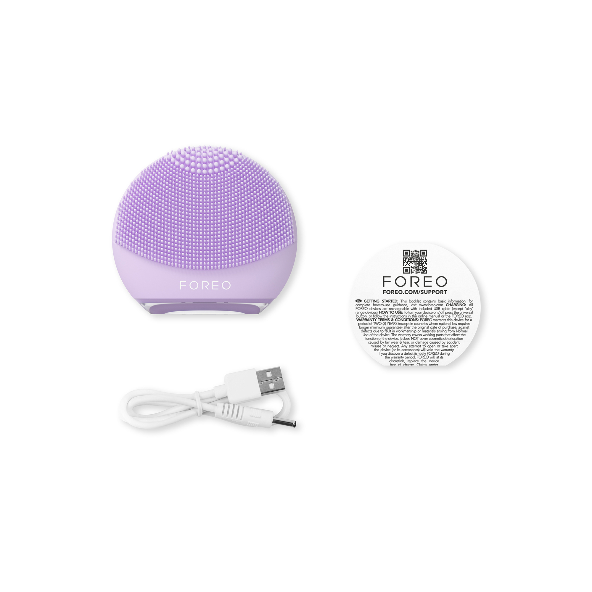 A purple FOREO face cleansing device with a charging cable and a support guide.