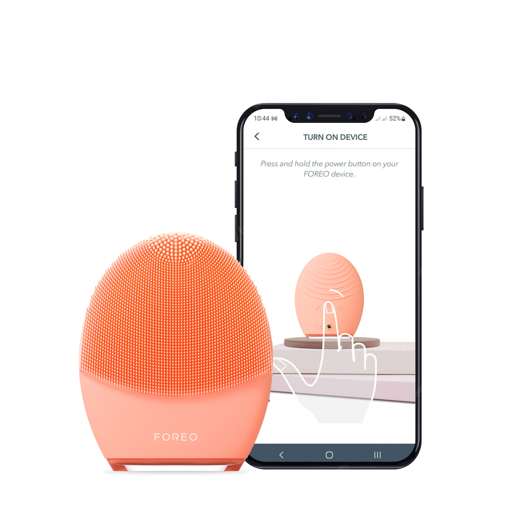 Foreo Luna device with a mobile phone showing how to turn on the device.