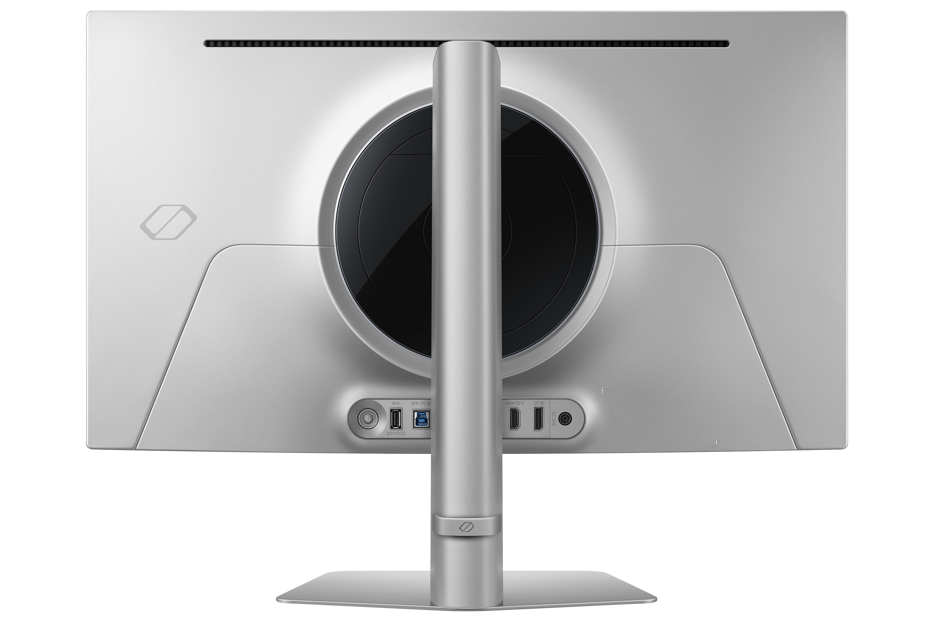 Vista posteriore di un monitor grigio con luce circolare. Porte e supporto sottostanti visibili.