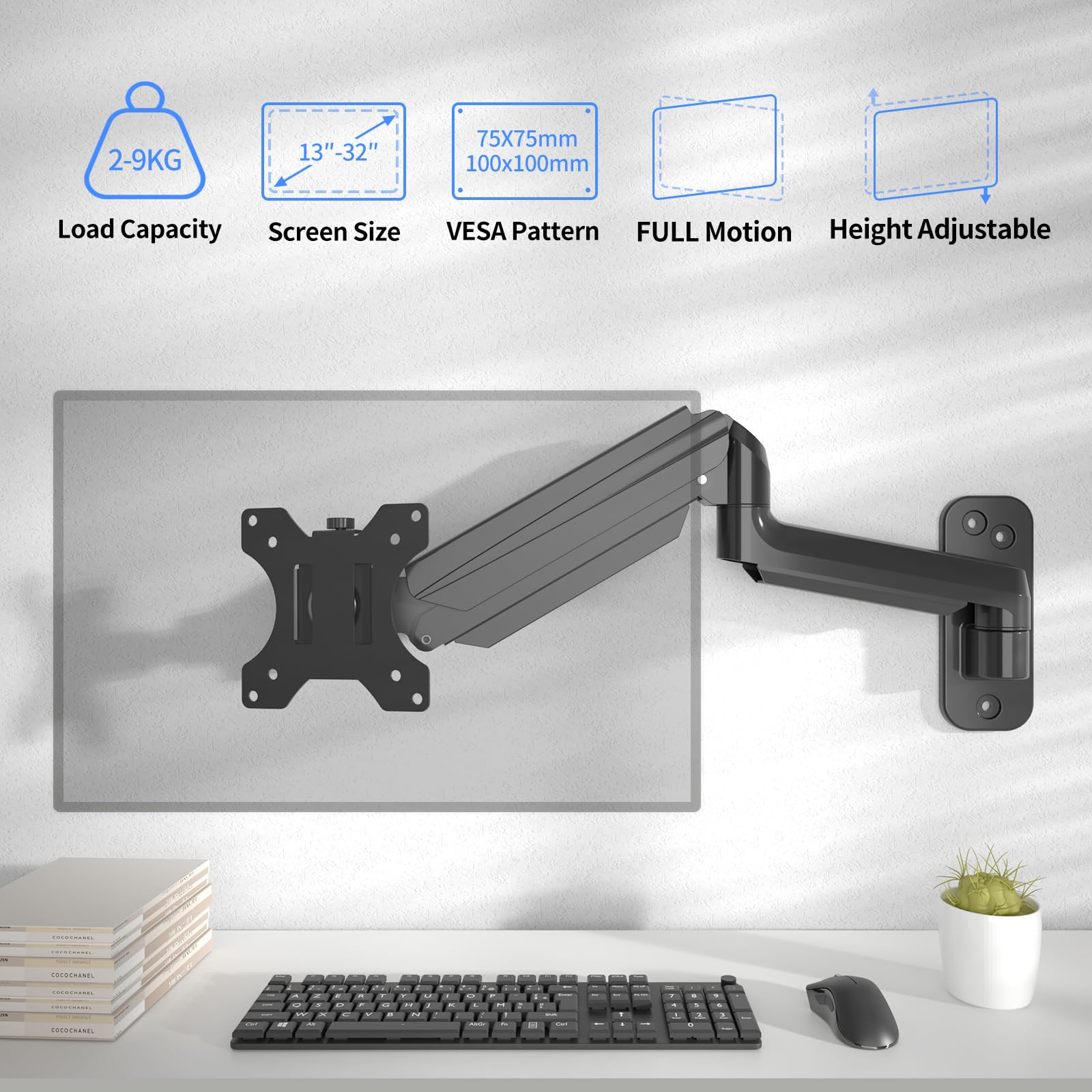 Monitorarm hält einen grauen Monitor. Schreibtisch mit Tastatur, Maus und Büchern.
