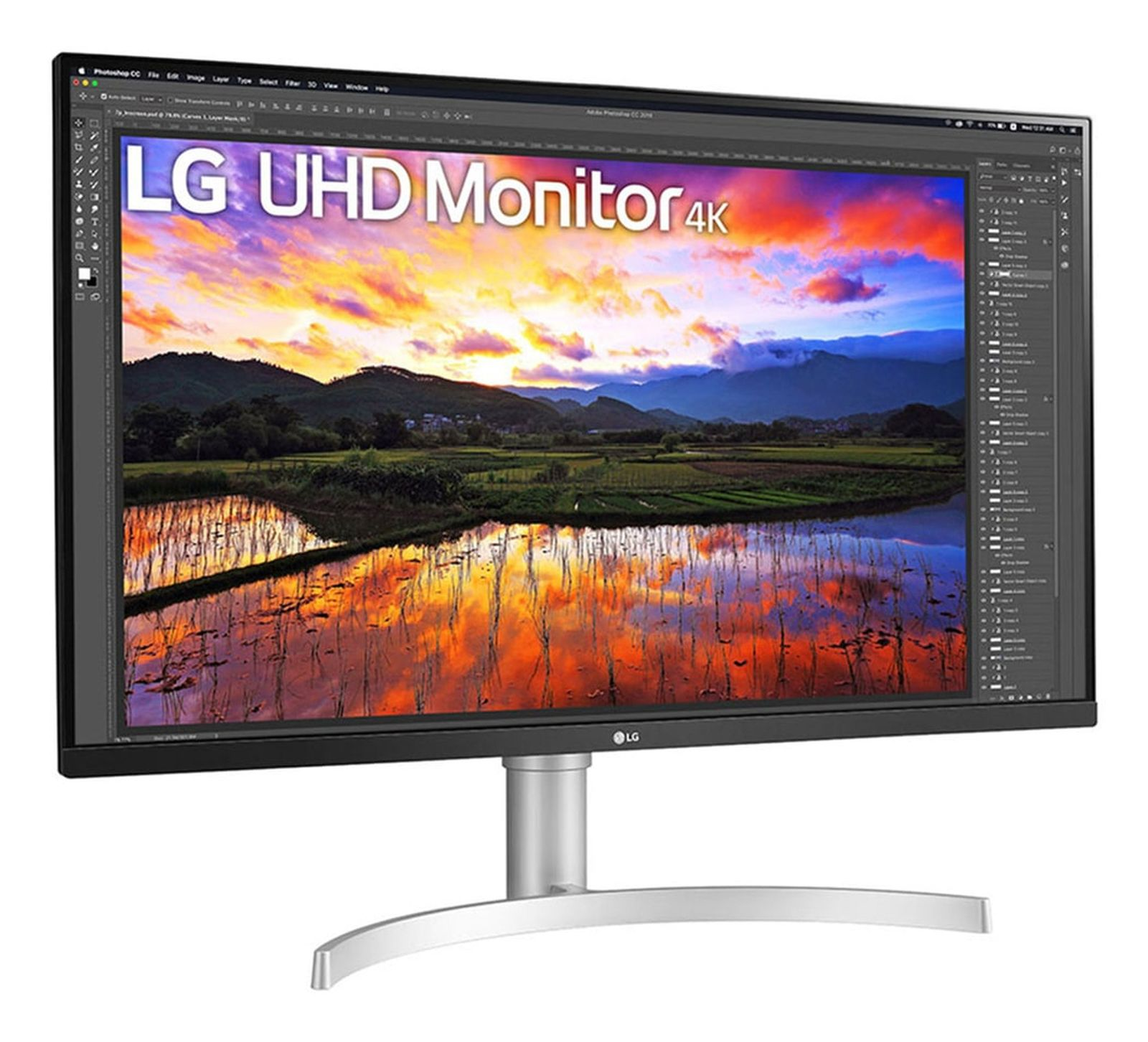 Monitor LG UHD 4K wyświetlający żywą scenerię krajobrazu. Monitor ma srebrną podstawę i czarną ramkę.