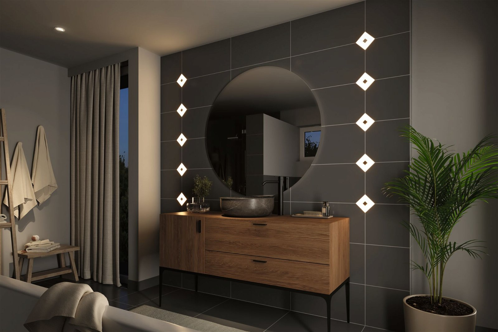 Bagno moderno con specchio, mobile e luci. Include pianta e asciugamani.