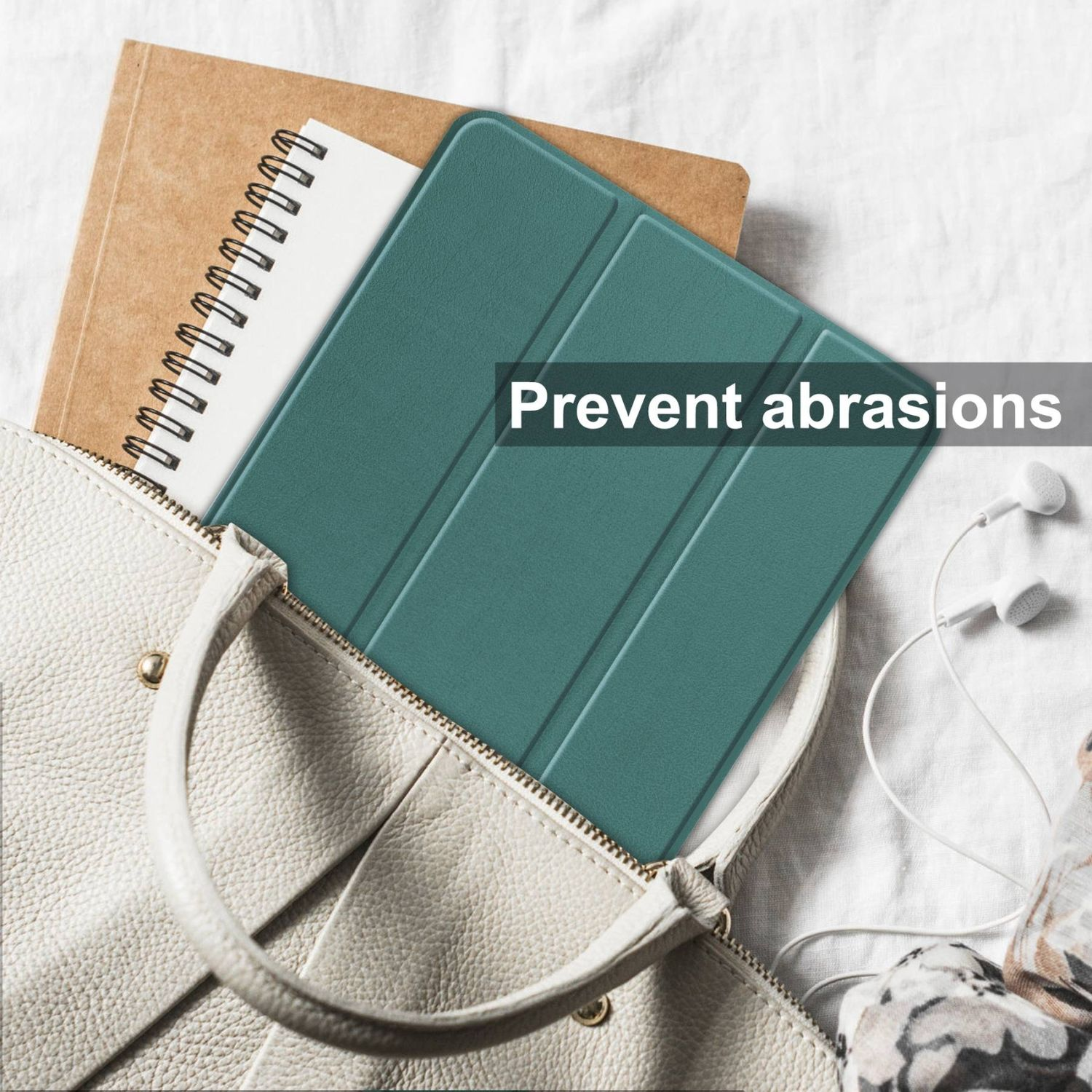 Türkis Tablethülle in einer Tasche mit Notizbuch und Kopfhörern. Text: Abrieb verhindern.