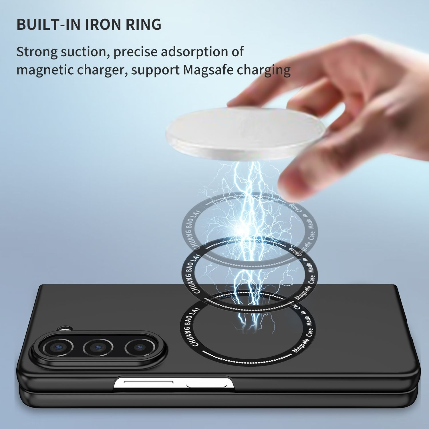 Schwarzes Telefon mit Magnetringen und eine Hand darüber. Elektrizität funkt zwischen ihnen.