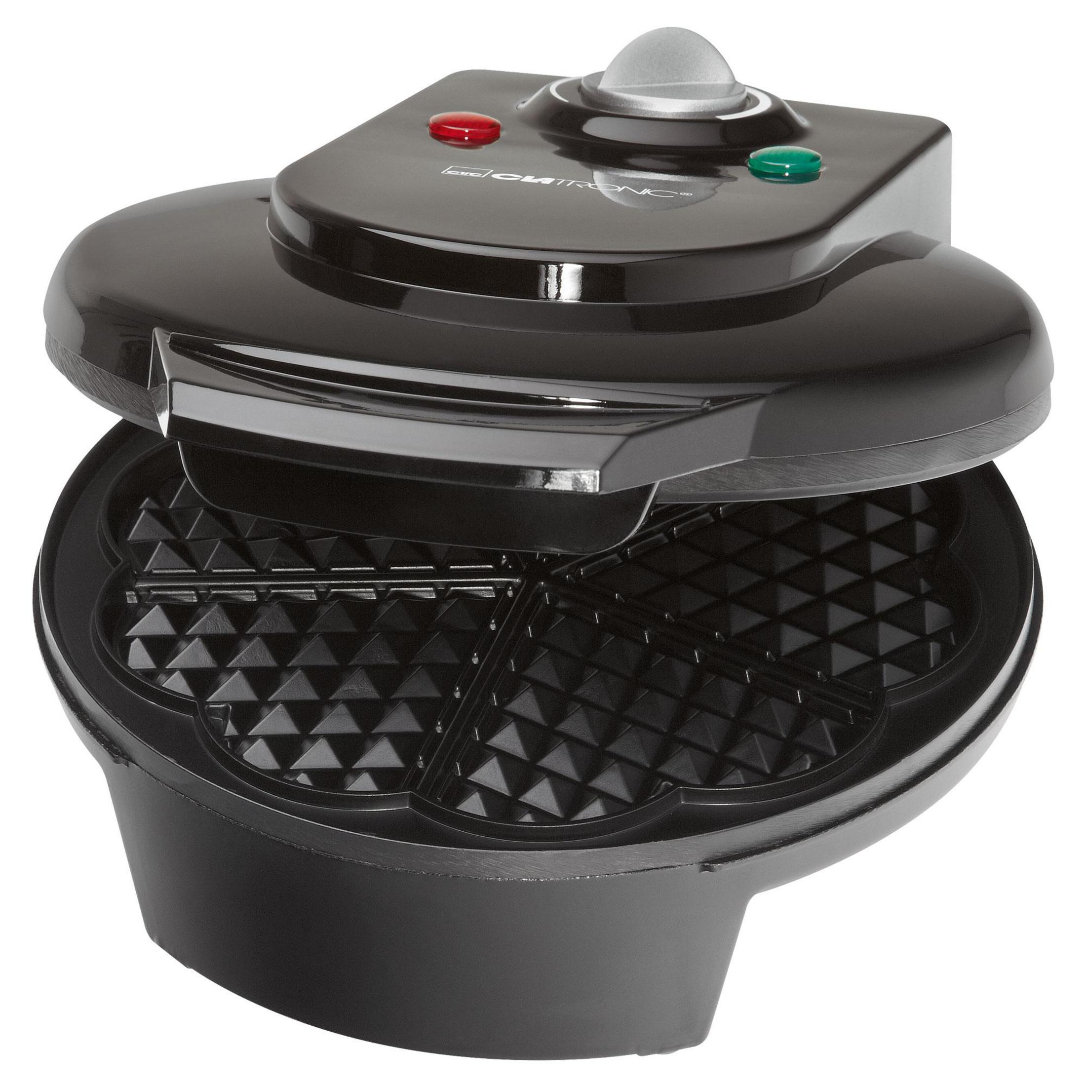Czarny gofrownica, otwarta. Wnętrze pokazuje kratki do gofrów. Góra ma czerwone i zielone światła.