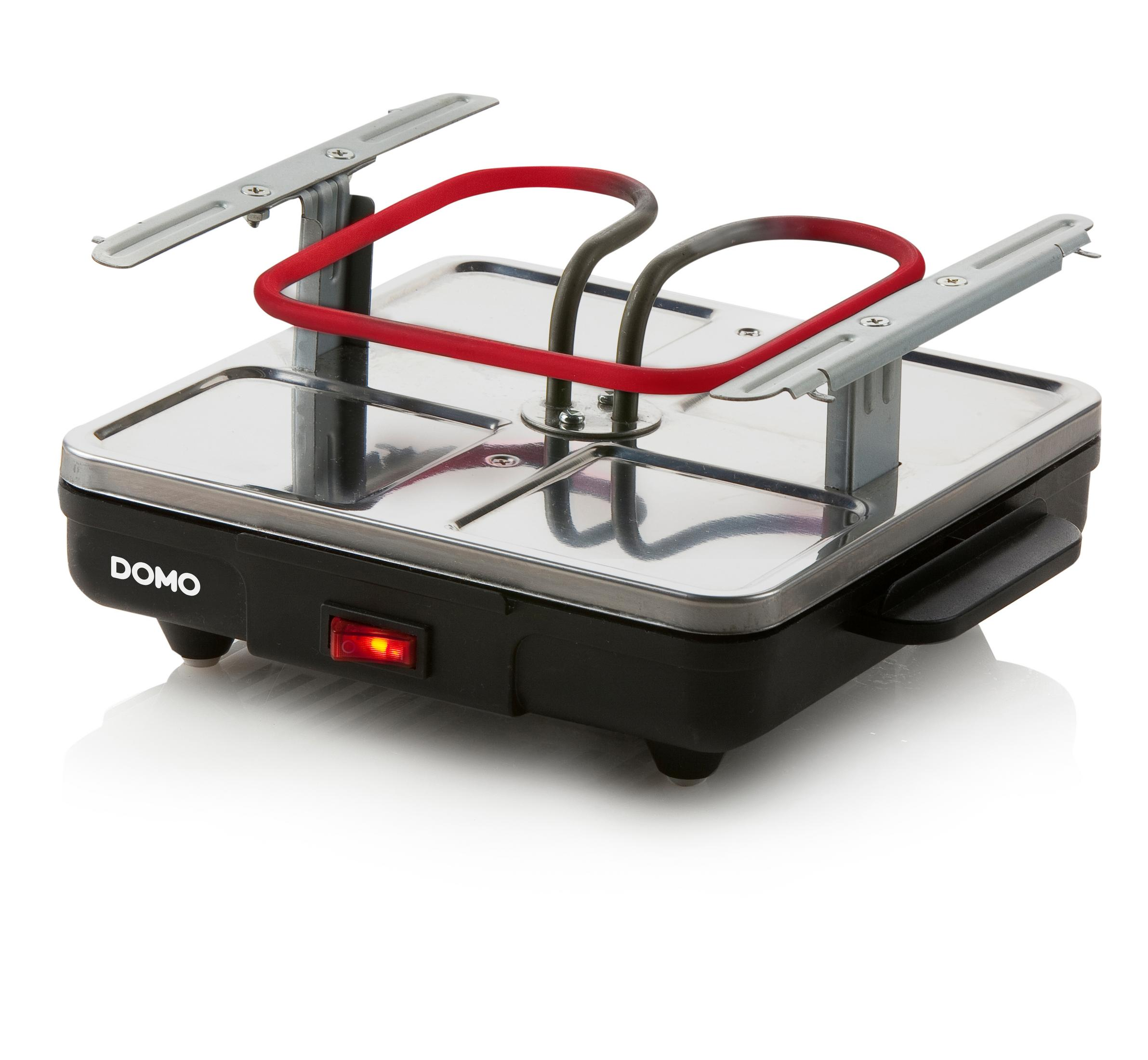 Ein schwarzer und silberner elektrischer Crêpe-Maker mit rotem Heizelement und Ein-/Ausschalter.