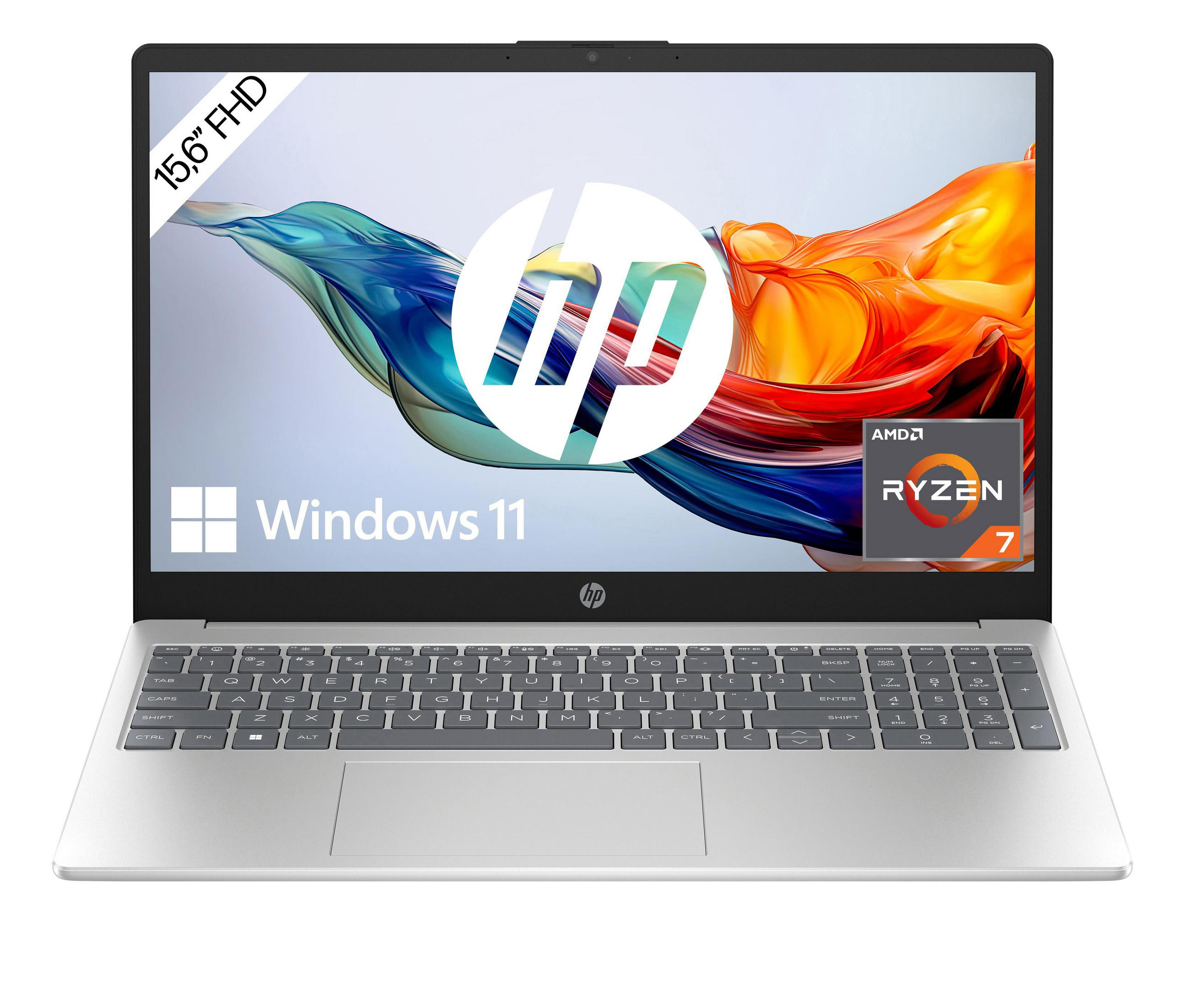 Ein silberner Laptop mit Windows 11 und AMD Ryzen 7 Logos auf dem Bildschirm.
