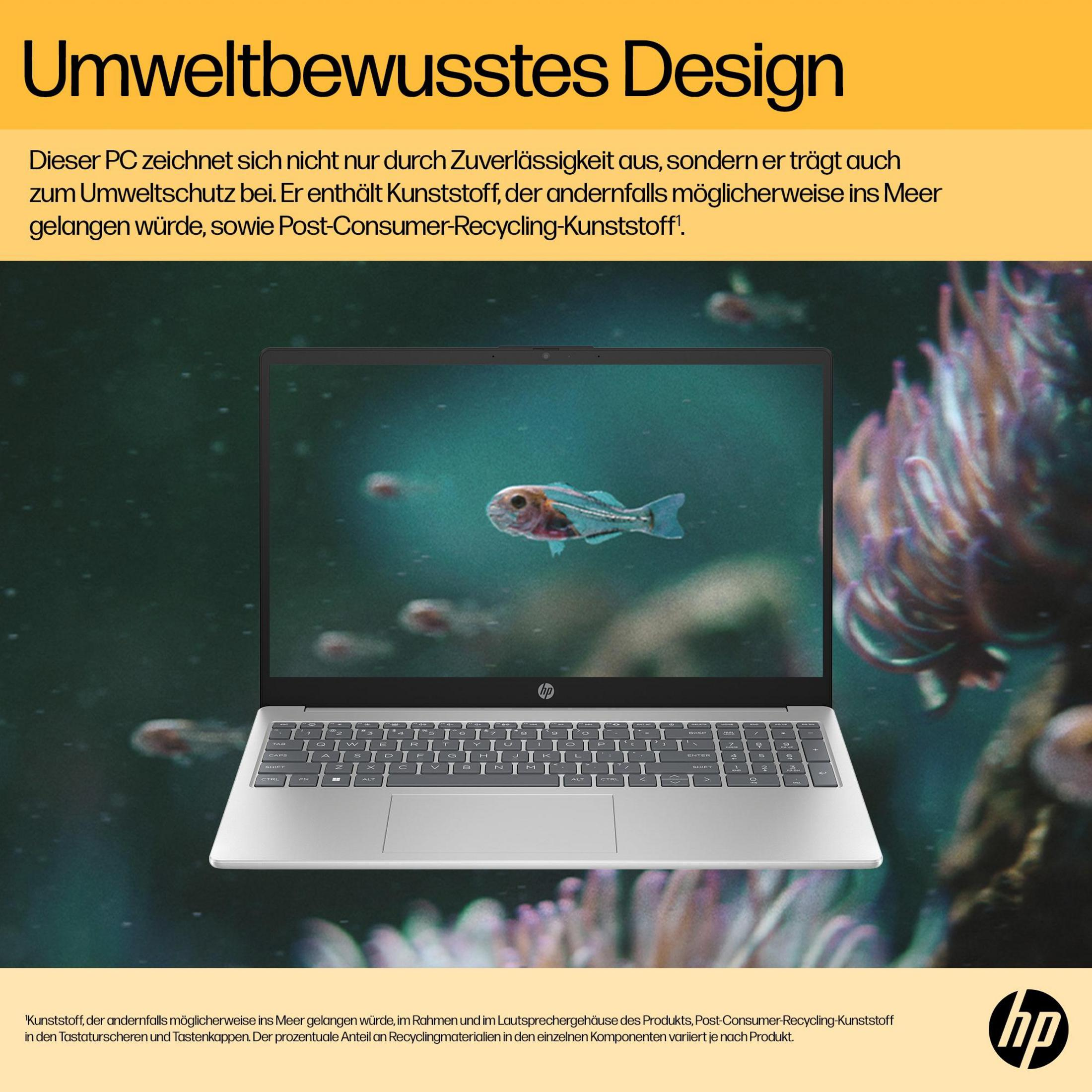 Ein Laptop zeigt einen Fisch im Wasser. Im Hintergrund sind andere Fische und Wasserpflanzen.