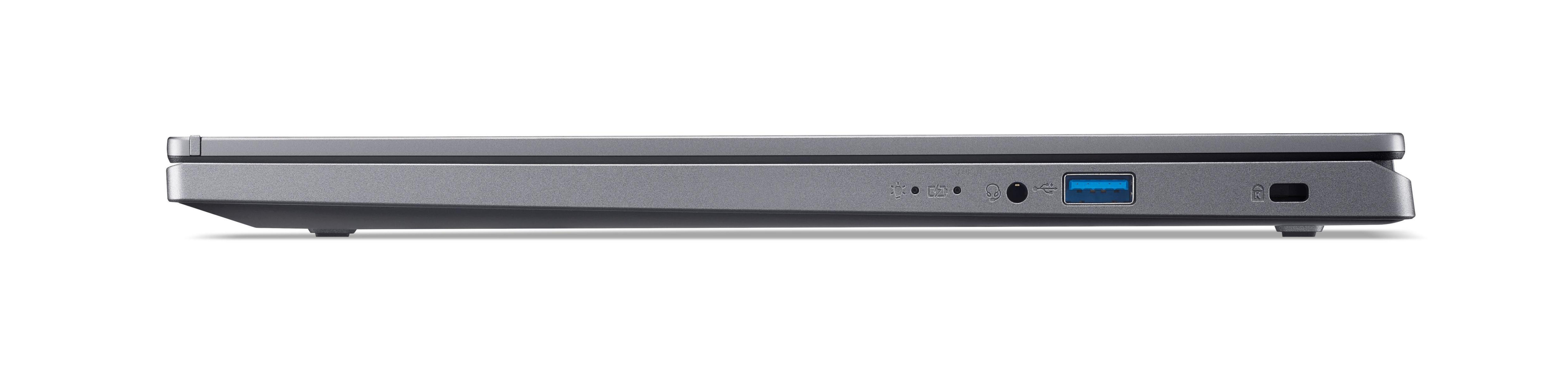 Seitenansicht eines silbernen Laptops, zeigt Anschlüsse und Verbindungen. Weißer Hintergrund.