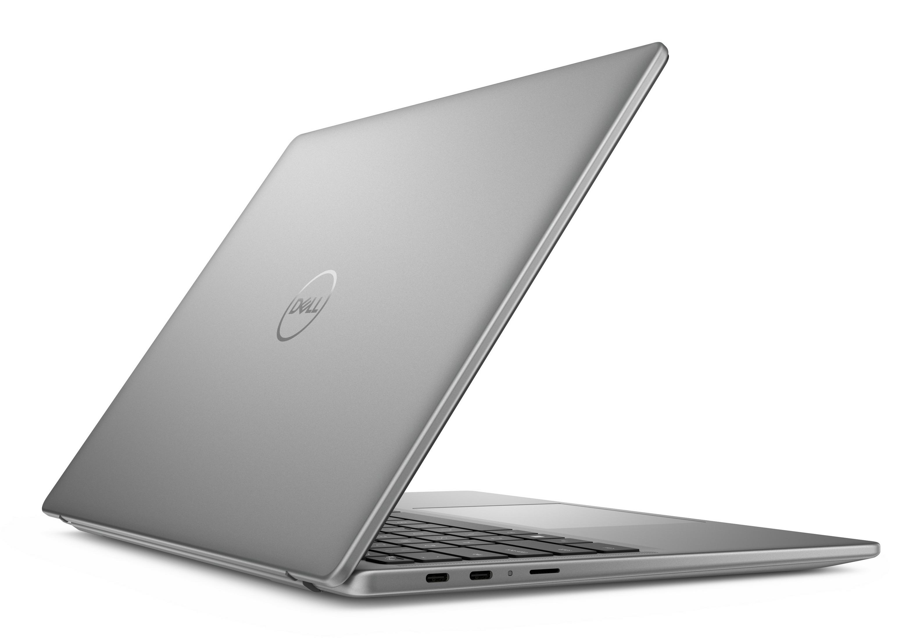 Srebrny laptop Dell, widok z tyłu, lekko otwarty. Widoczne logo Dell. Białe tło.
