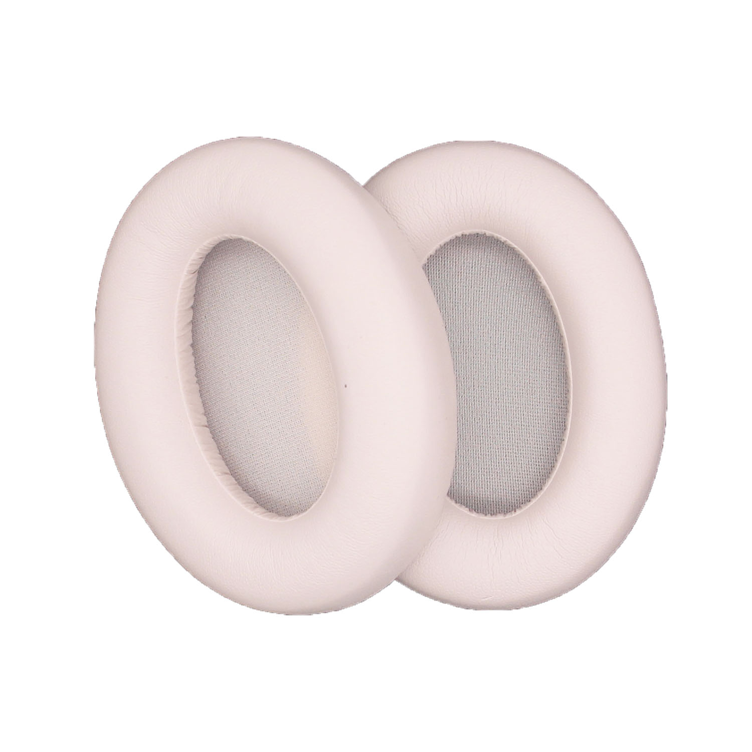 Due cuscinetti auricolari. Cuscinetti rosa pallido. Lo sfondo è bianco.