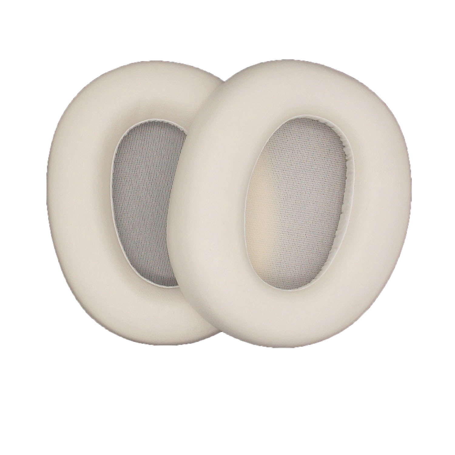 Due cuscinetti auricolari ovali bianchi. Sfondo bianco.