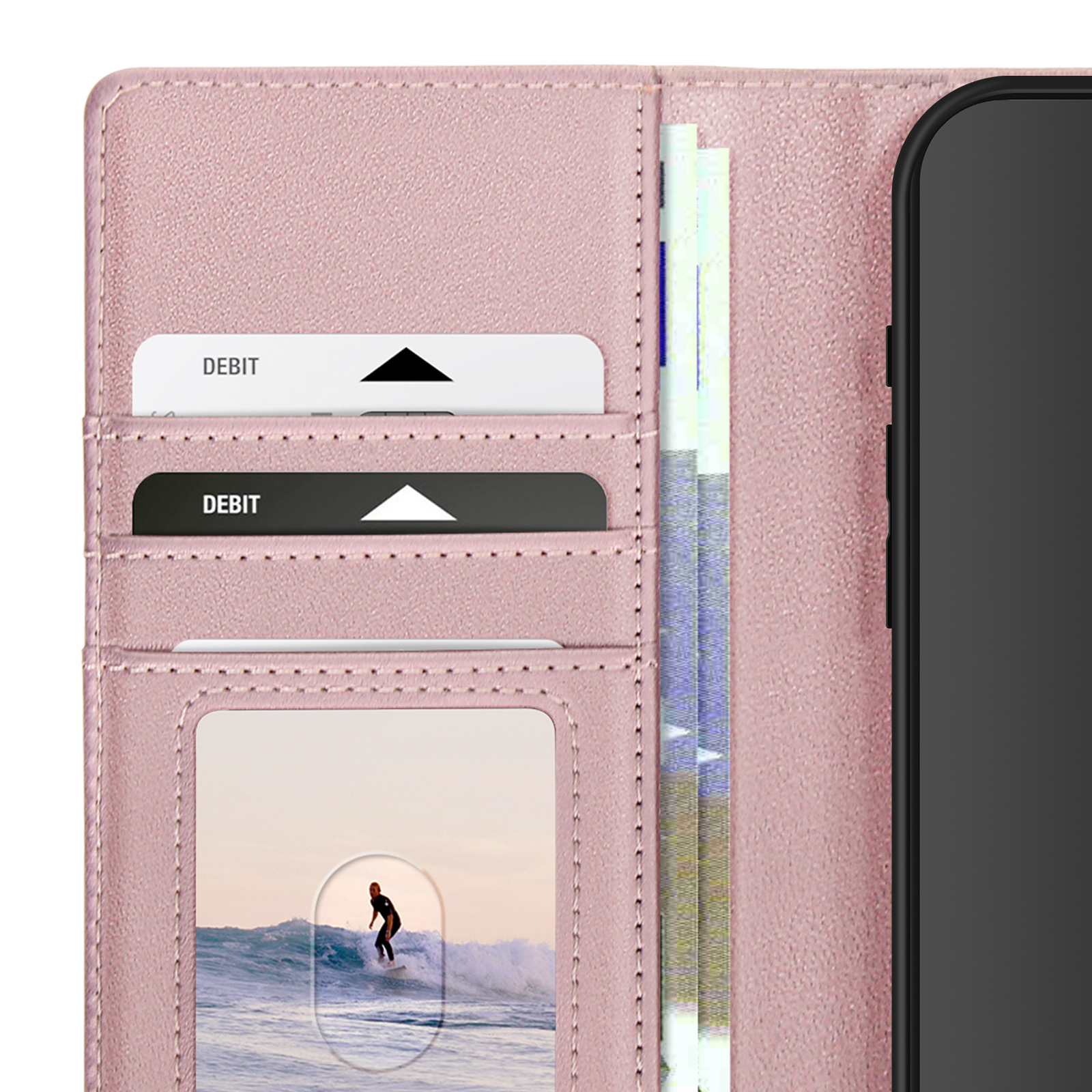 Custodia a portafoglio rosa con carte di debito, denaro e telefono. Surfista sull'onda.