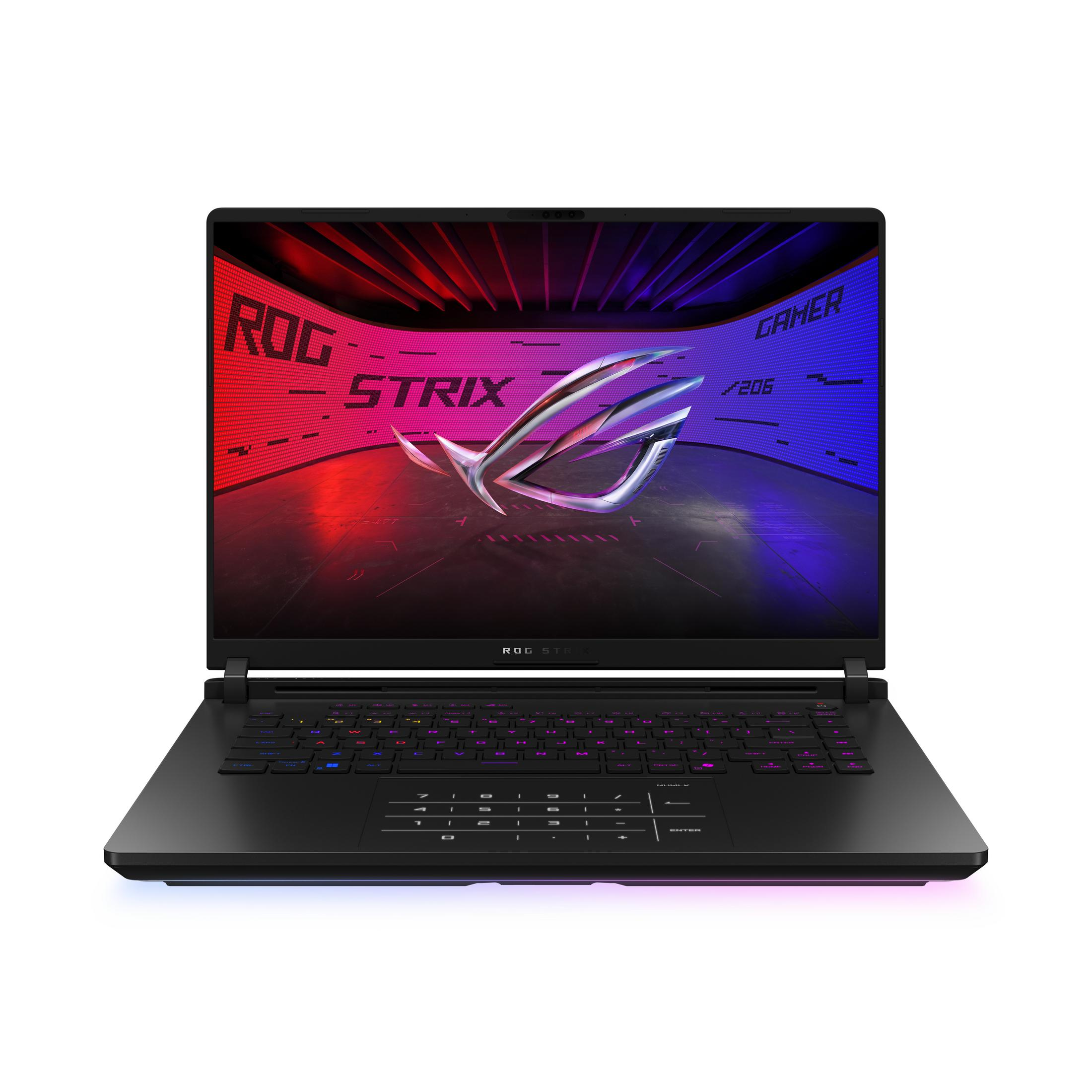 Schwarzer Laptop auf dem Schreibtisch. ROG Strix Bildschirm. Kopfhörer und Maus an den Seiten. Gaming-Setup.