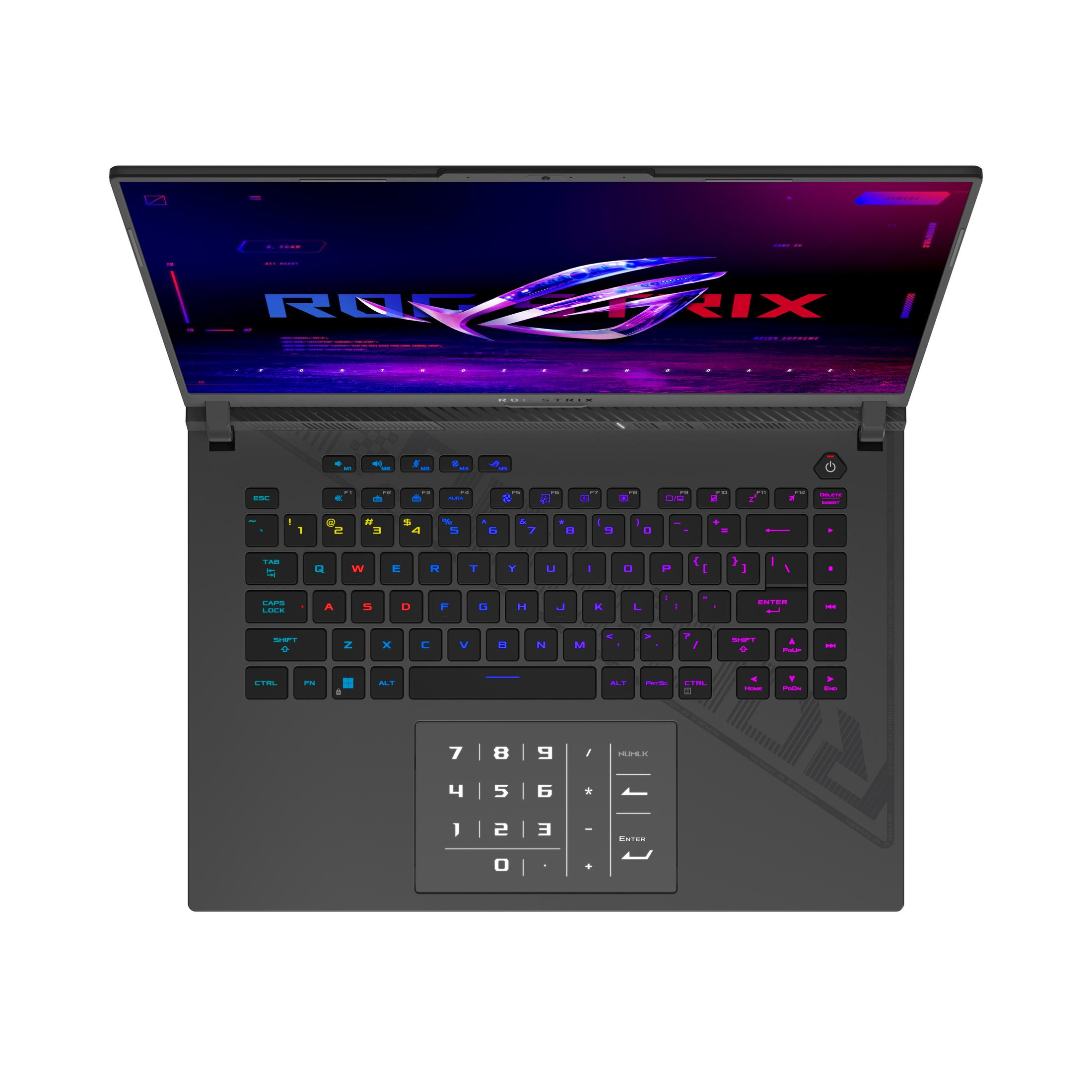 Schwarzer Laptop, offen, Draufsicht. Tastatur mit RGB-Lichtern, Bildschirm zeigt ROG-Logo, dunkler Hintergrund.