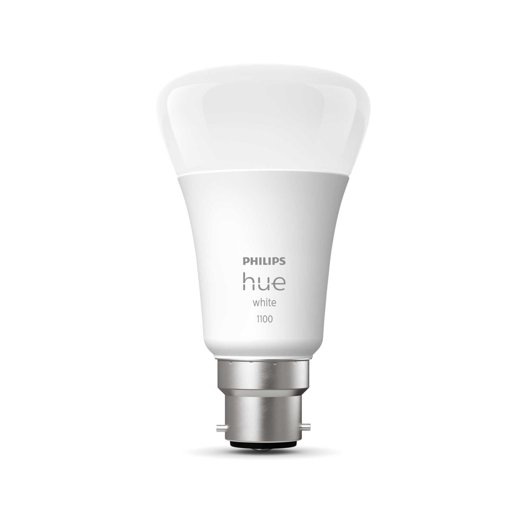 Una lampadina intelligente Philips Hue in piedi, con sfondo bianco.