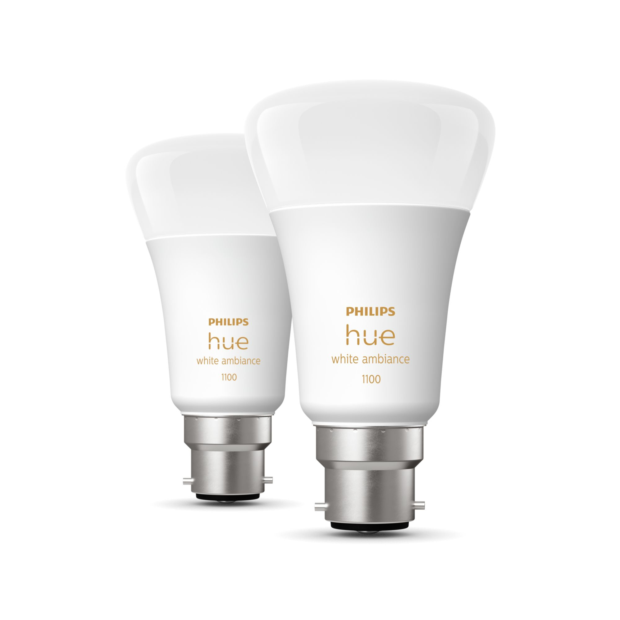Dwie żarówki Philips Hue White Ambiance na białym tle.