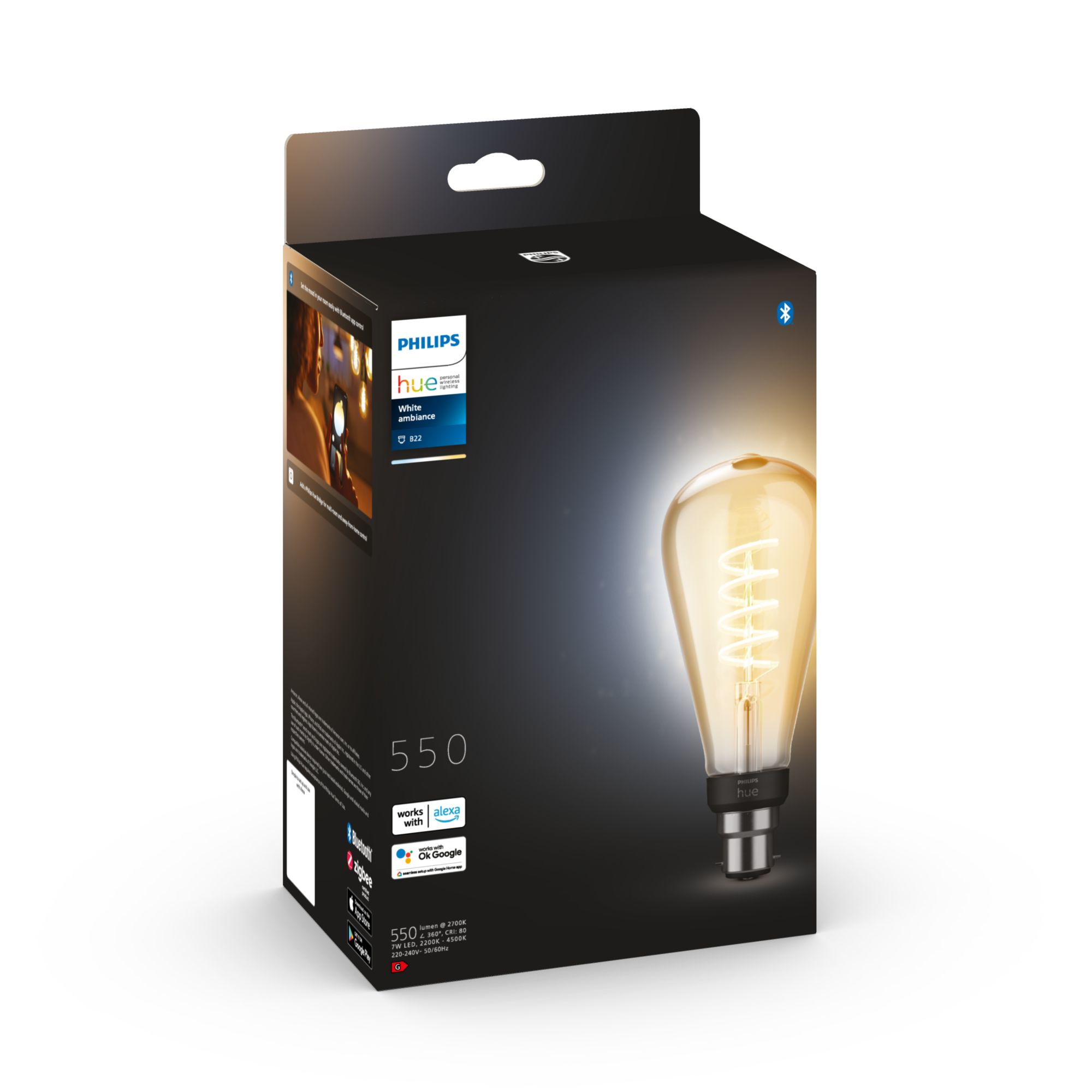 Pudełko z żarówką Philips Hue. Żarówka świeci ciepło, na białym tle.