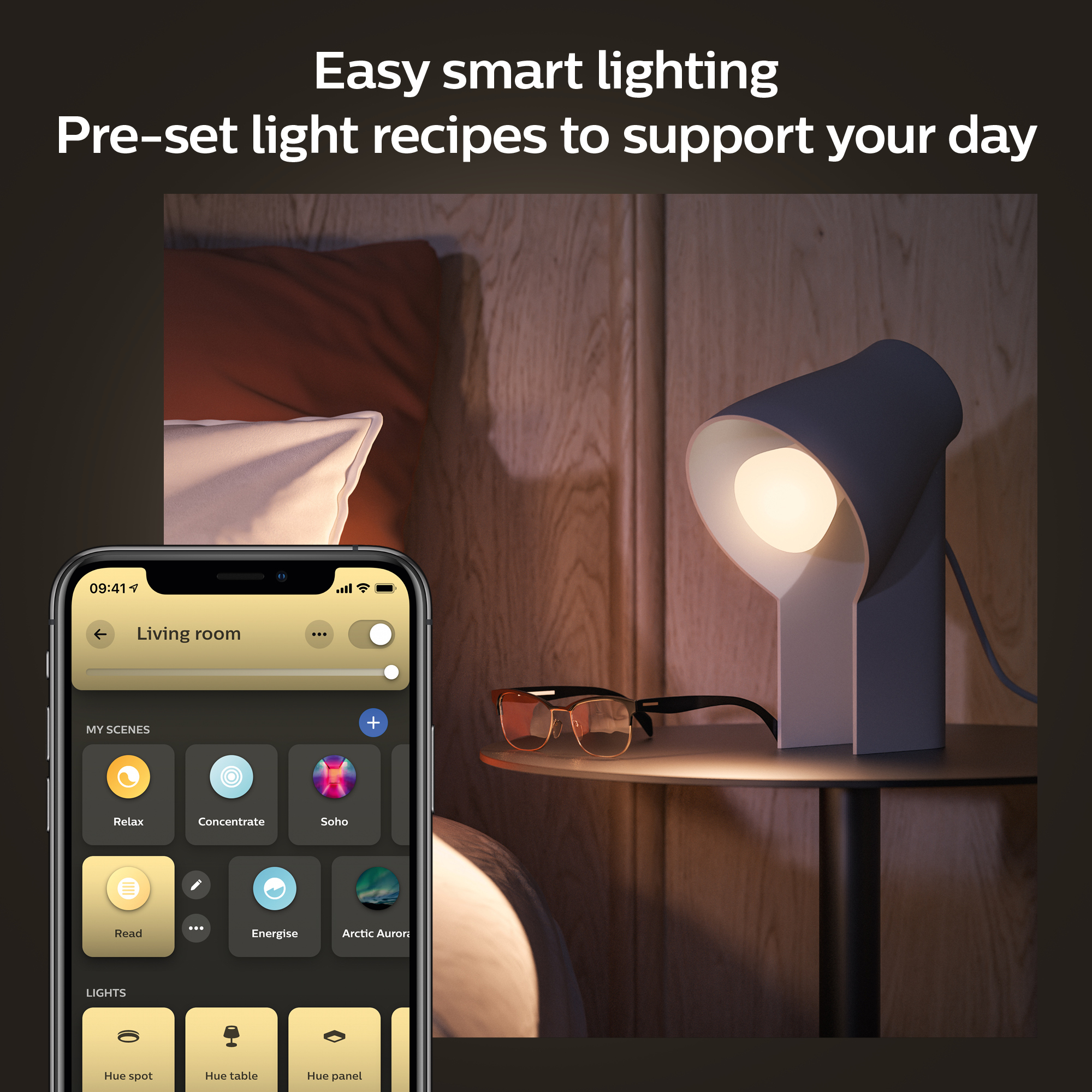 Smartfon kontrolujący inteligentną lampę, lampę stołową i okulary. Miękkie oświetlenie.