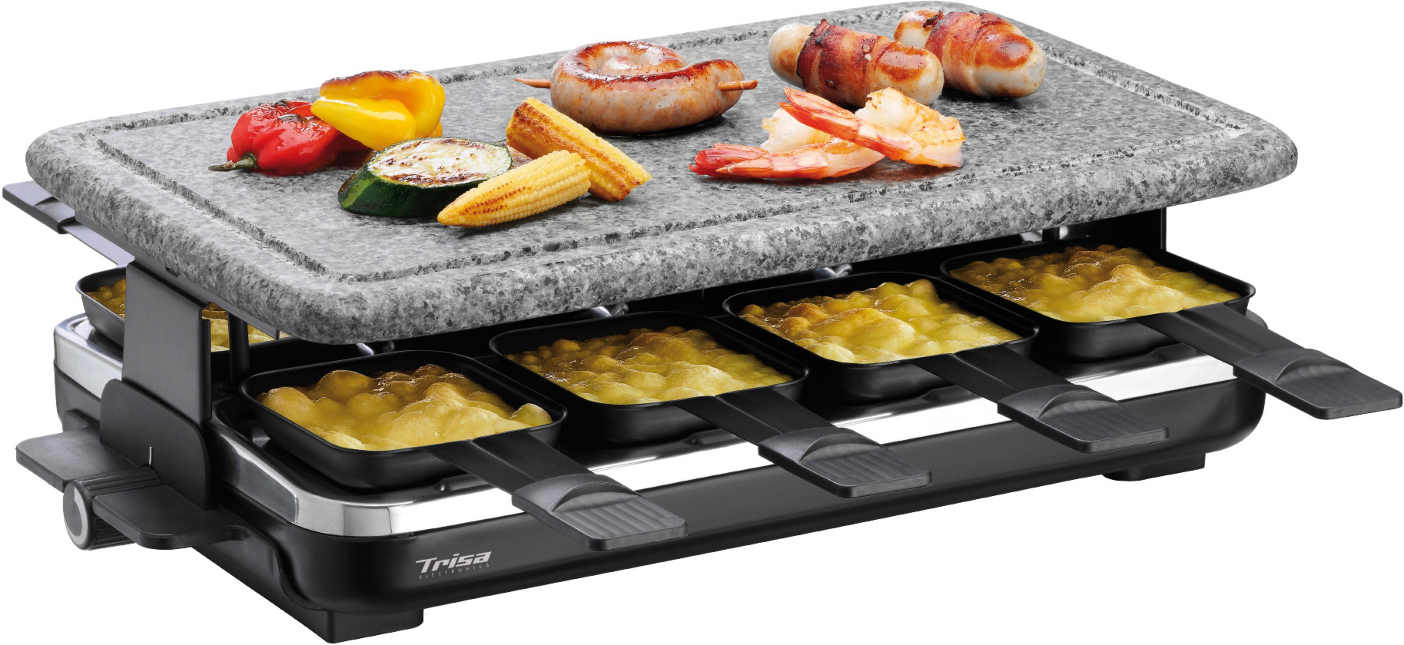 Grill do raclette z serem i grillowanymi potrawami, w tym warzywami i kiełbasami, na stole.