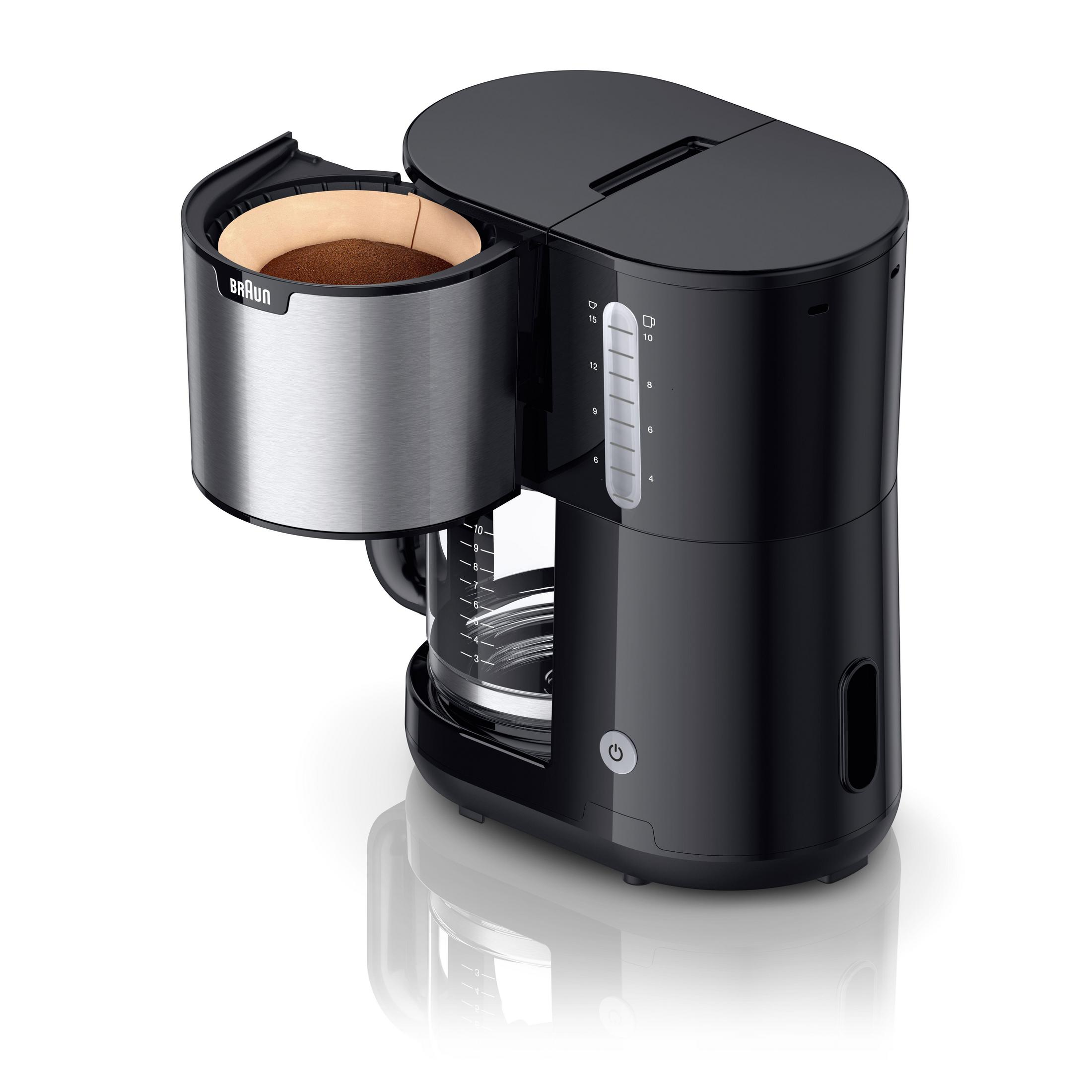 Czarno-srebrny ekspres do kawy. Szklana karafka z kawą. Białe tło.