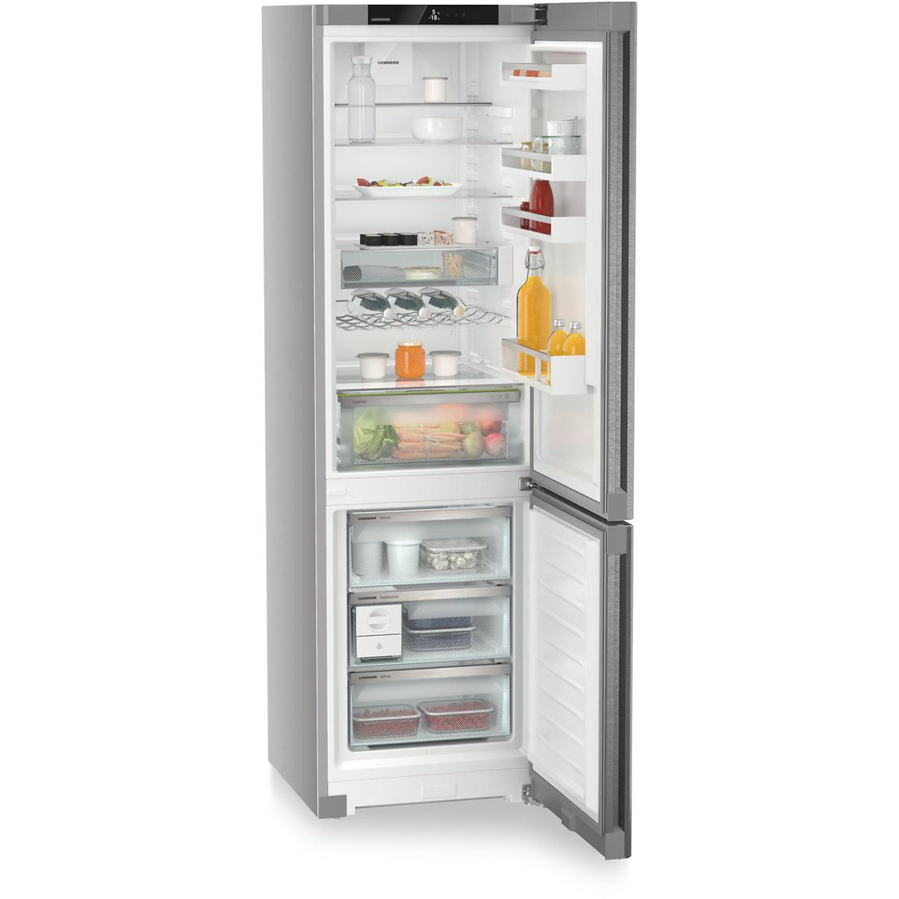 Refrigerador blanco con la puerta abierta. Se ven estantes interiores con alimentos.