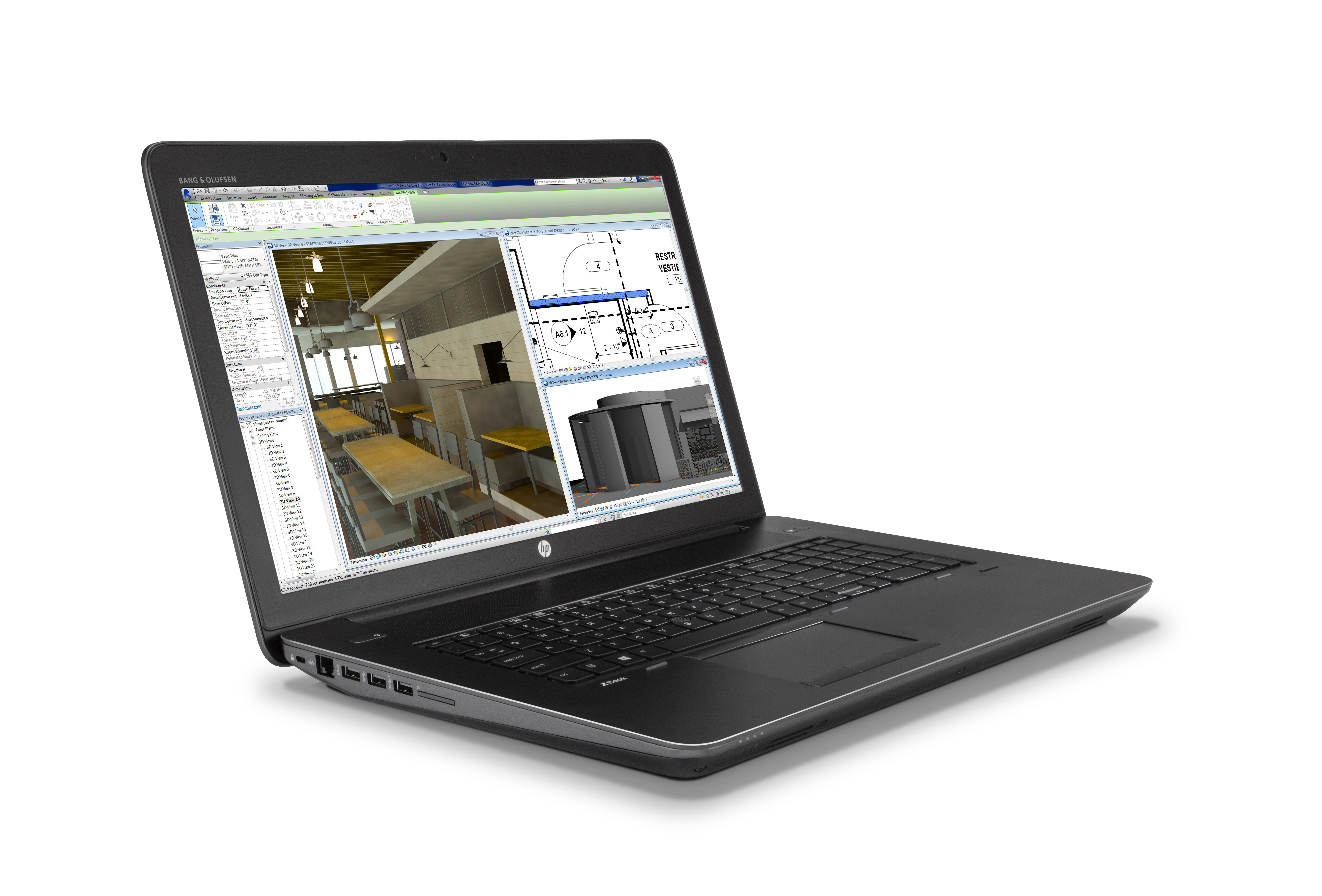 Ordenador portátil muestra software de diseño arquitectónico. Portátil negro sobre fondo blanco.
