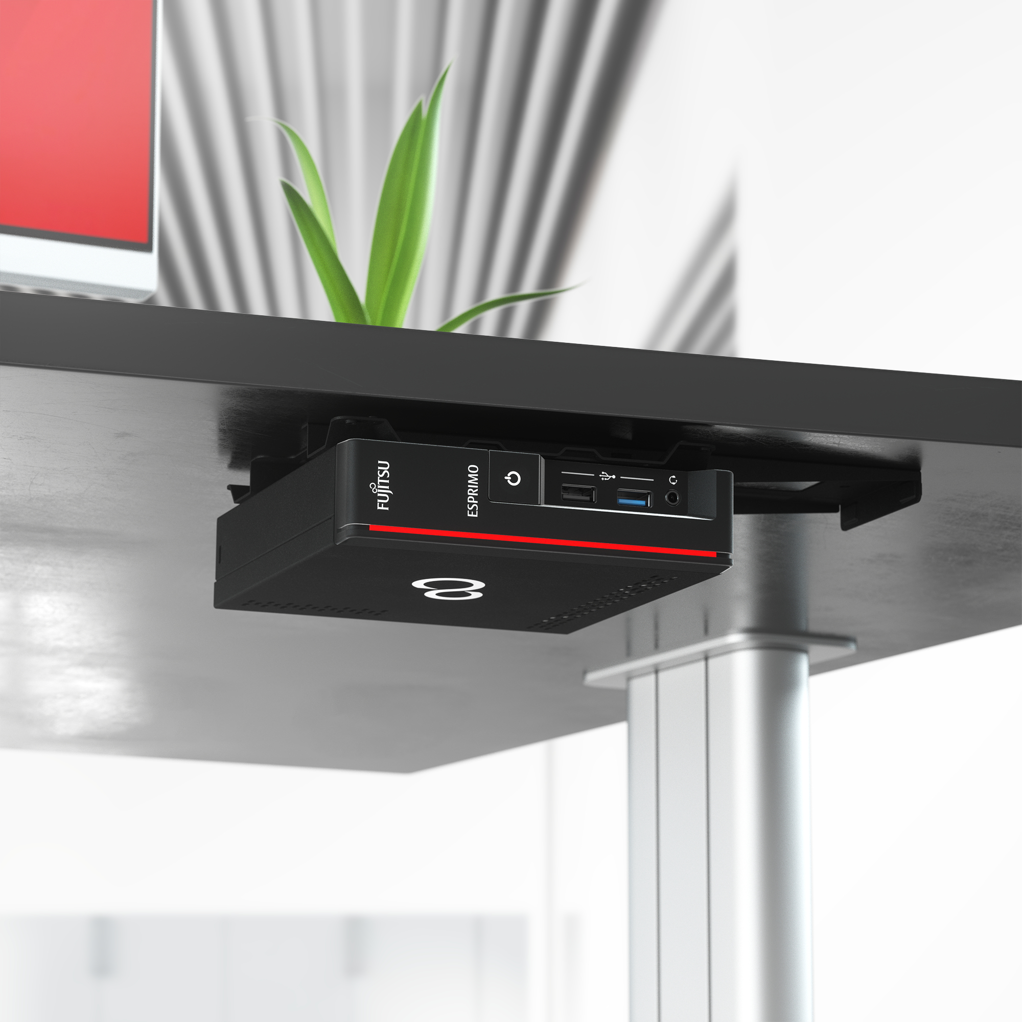 Black Fujitsu Esprimo PC mounted under desk. Red stripe, and Fujitsu logo.