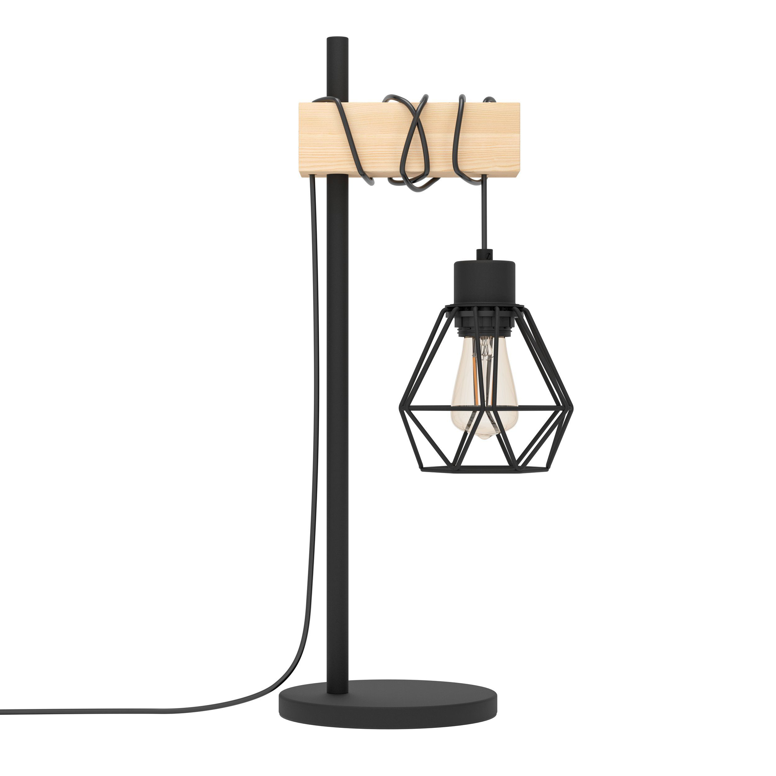 Una lampada nera con supporto in legno e una lampadina a gabbia. Lo sfondo è un muro bianco.