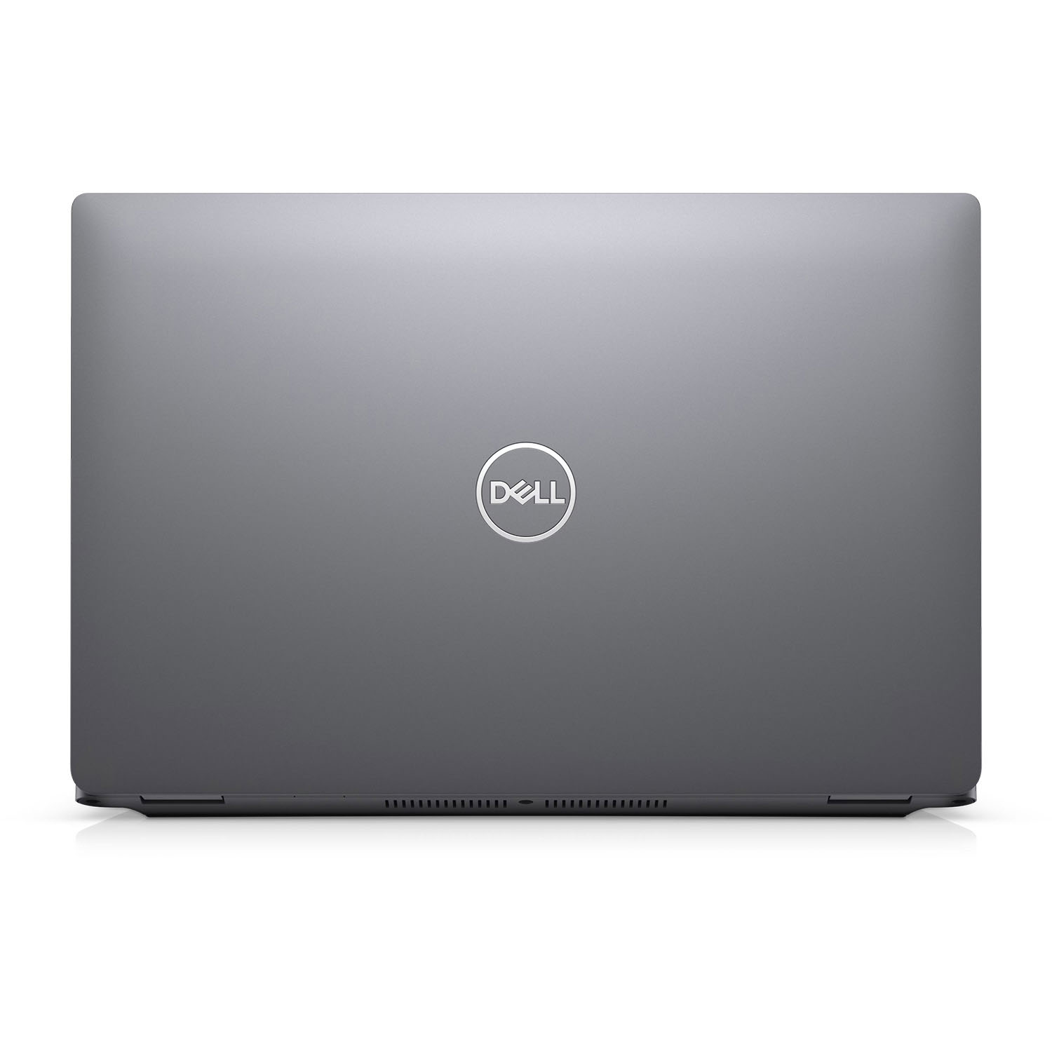Laptop gris, cerrado, con el logo de Dell en el centro de la tapa.