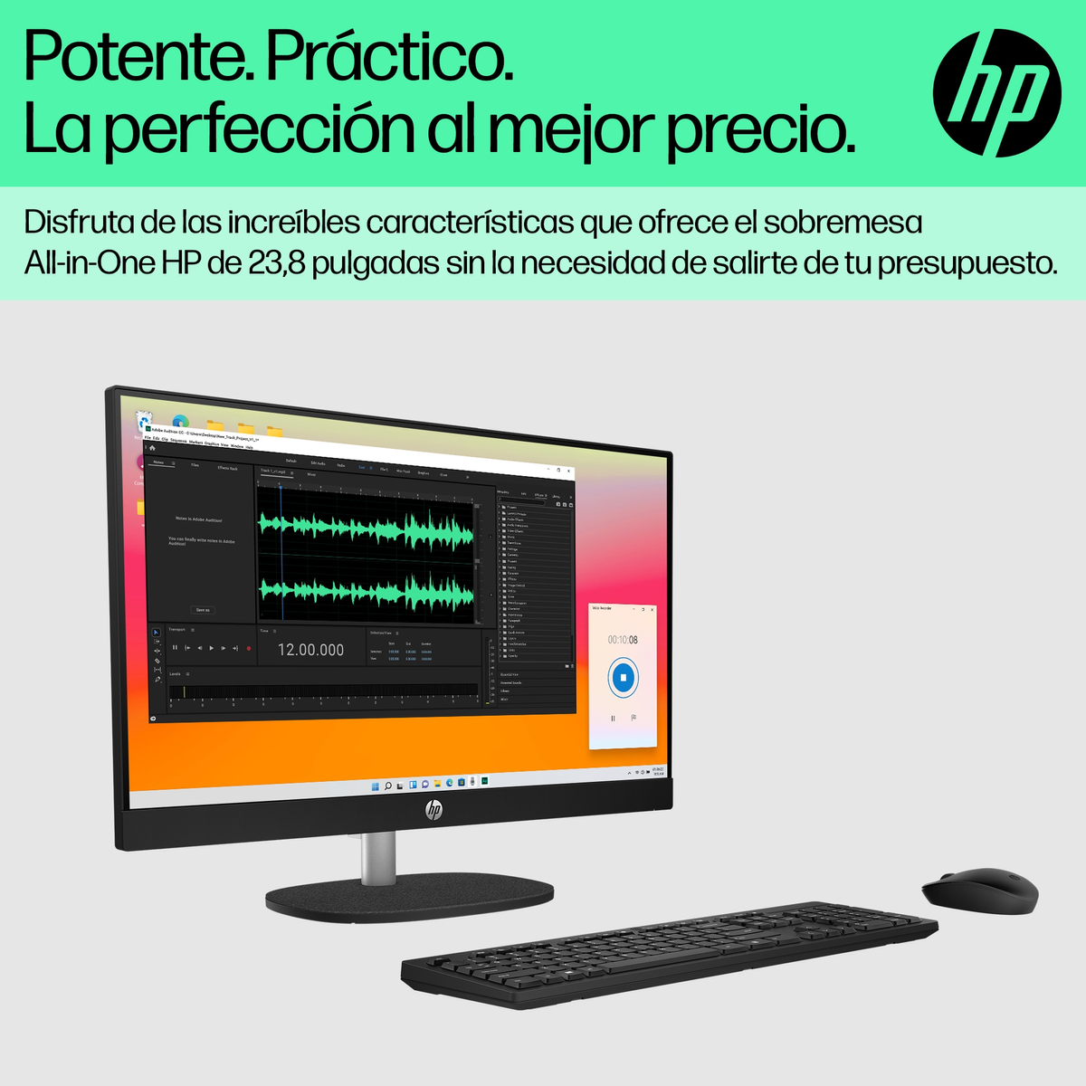 Computer all-in-one che mostra l'interfaccia di un software di editing audio con tastiera e mouse.