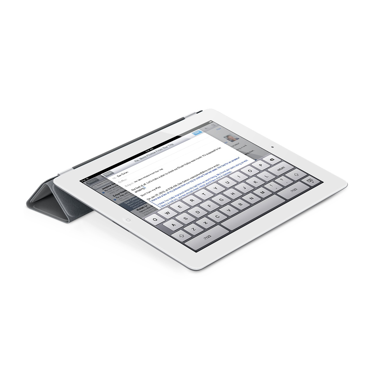 Ein offenes weißes Tablet mit Tastatur und Webseite, auf einem grauen Case.
