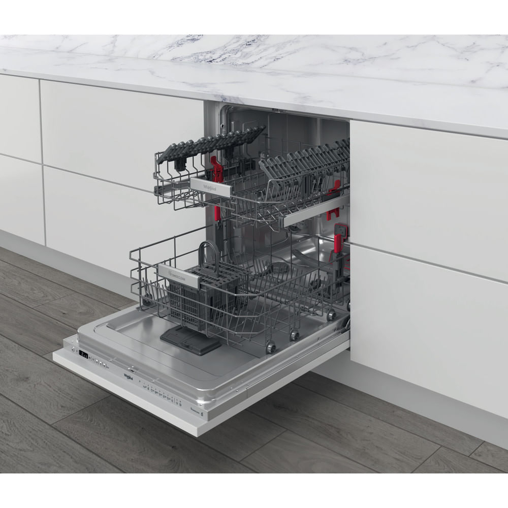 Dishwasher with open door, two racks visible. Interior is stainless steel.