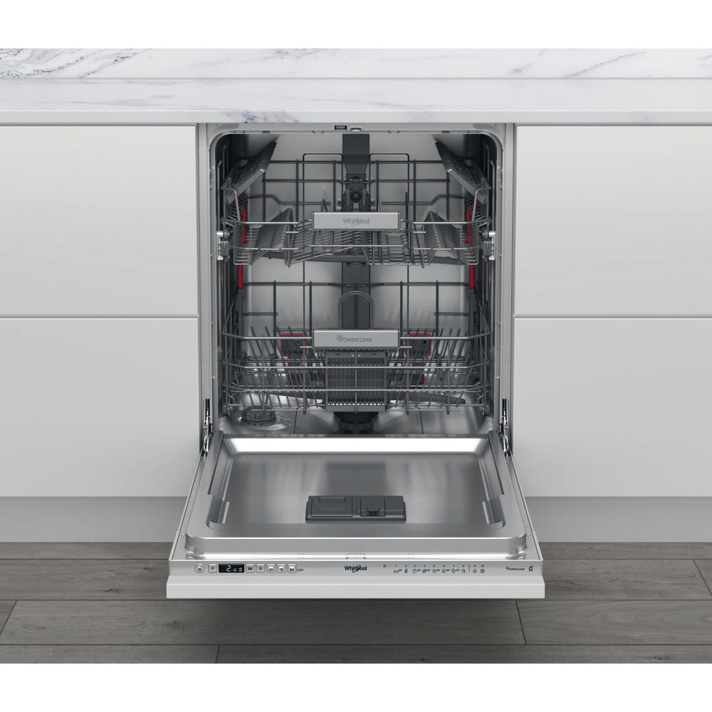 Dishwasher with open door. Interior shows racks and spray arms. White kitchen.