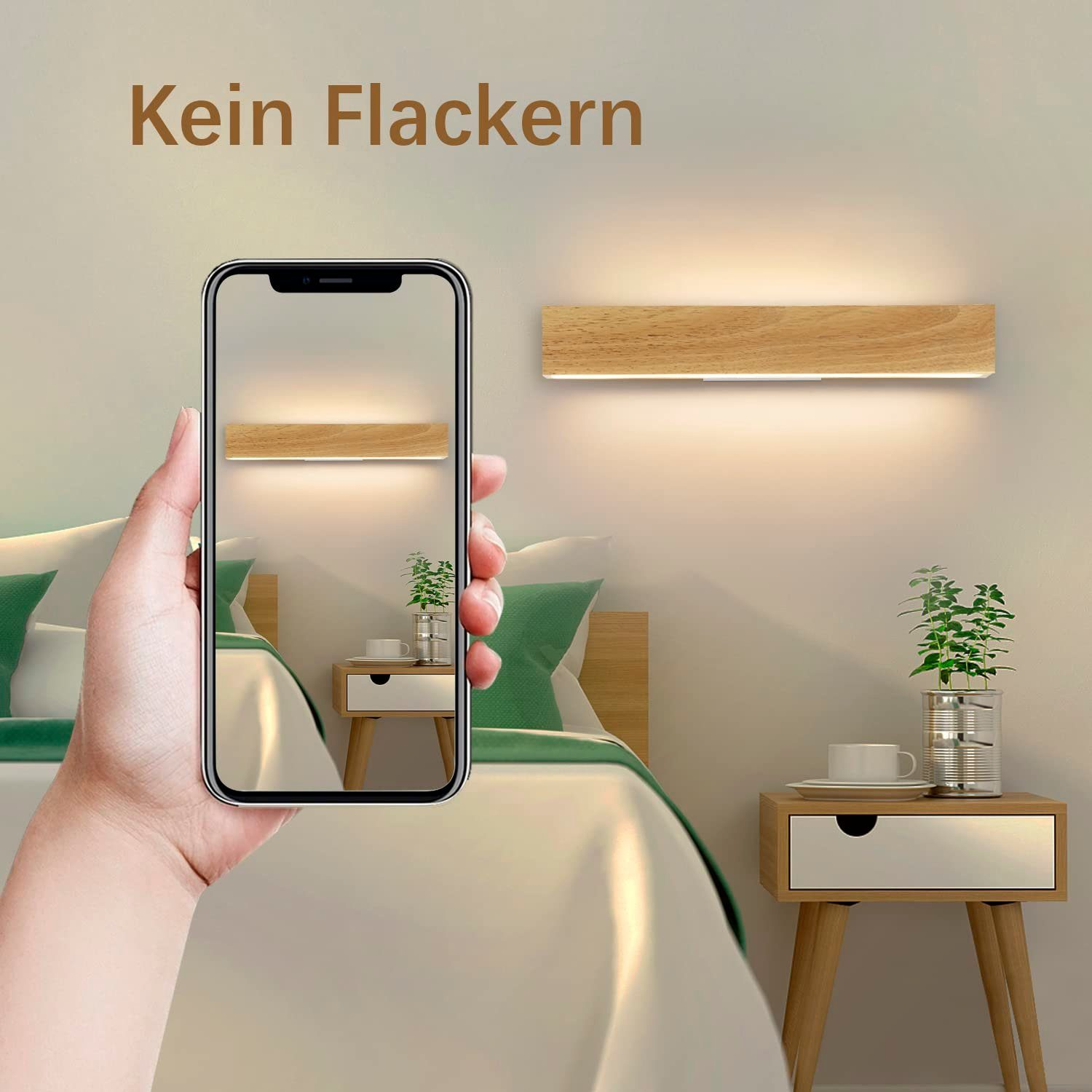 Mano che tiene il telefono che mostra una lampada da parete in legno sopra un letto e un comodino.