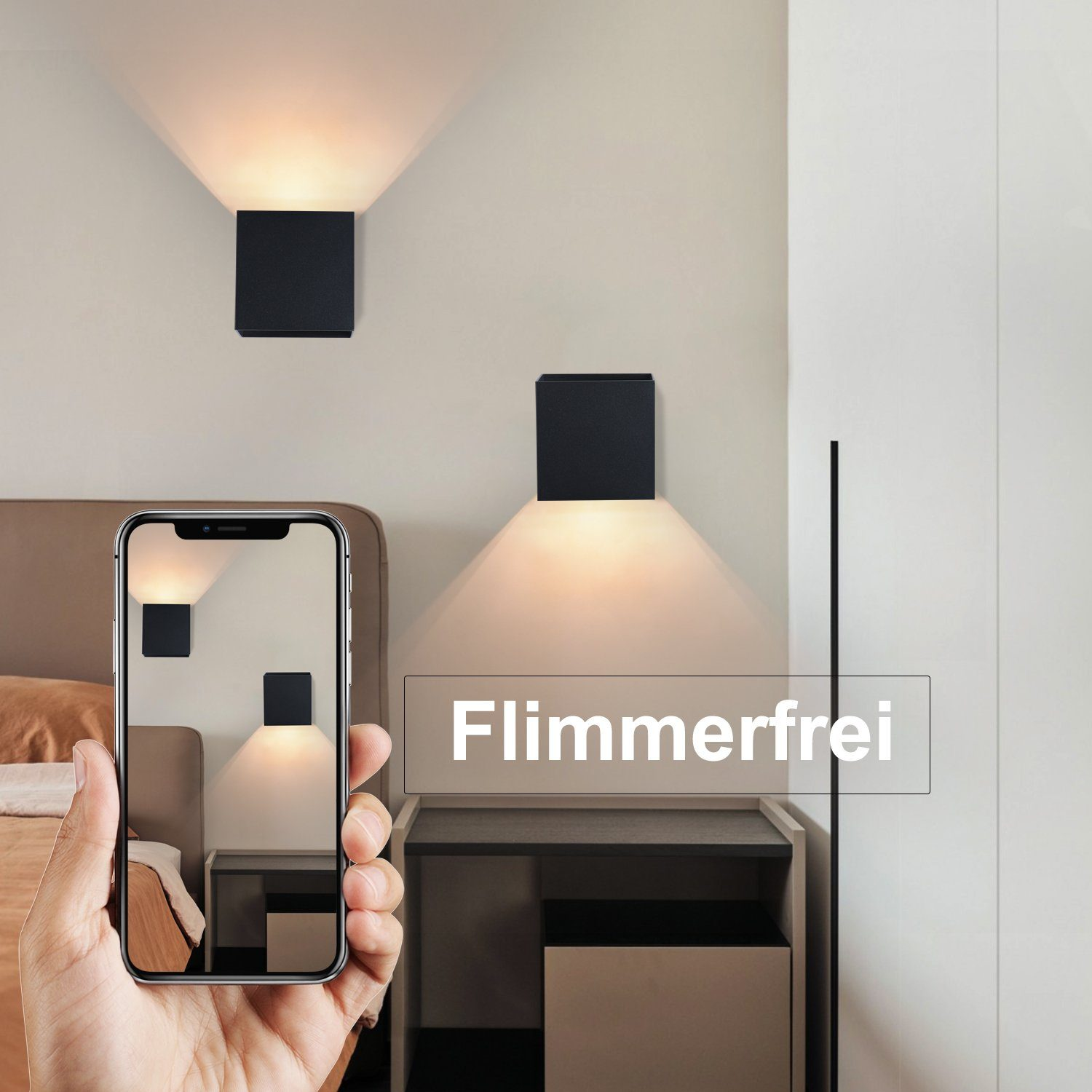Mano che tiene il telefono mostrando luci, con testo 'Flimmerfrei' (senza sfarfallio).