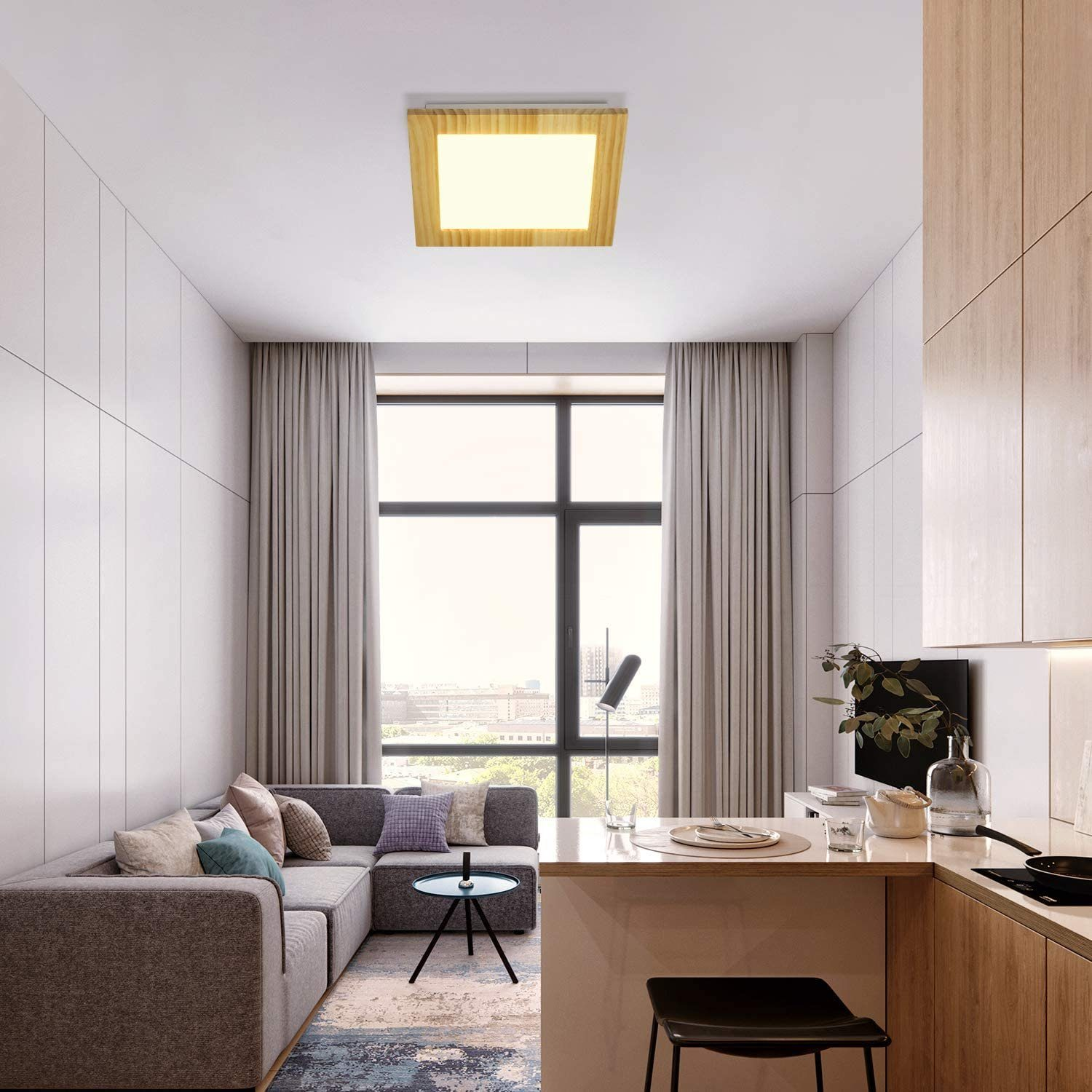 Modernes Apartment-Interieur mit grauem Sofa, Holzakzenten und quadratischer Deckenleuchte.