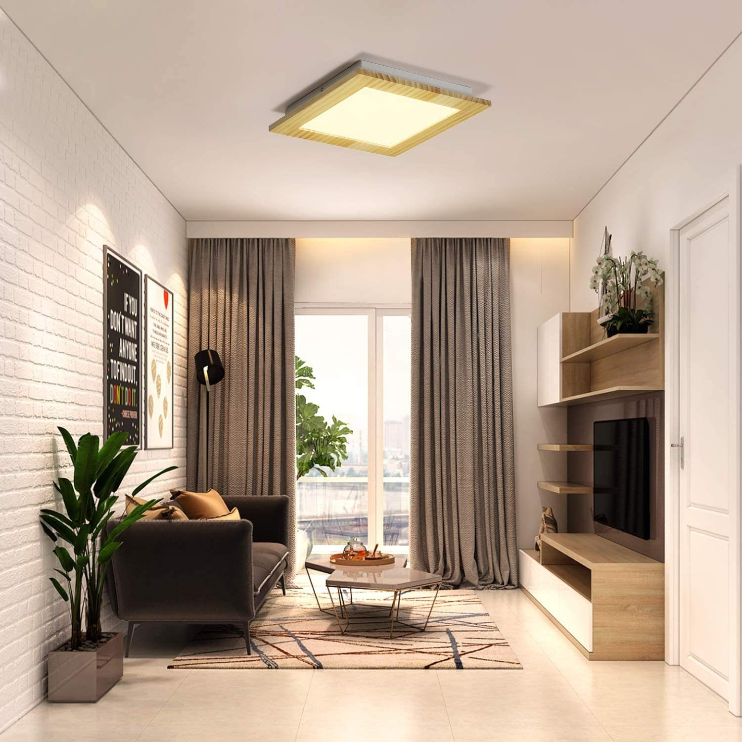 Ein Wohnzimmer mit modernem Design, mit Sofa, Tisch und Fenster.