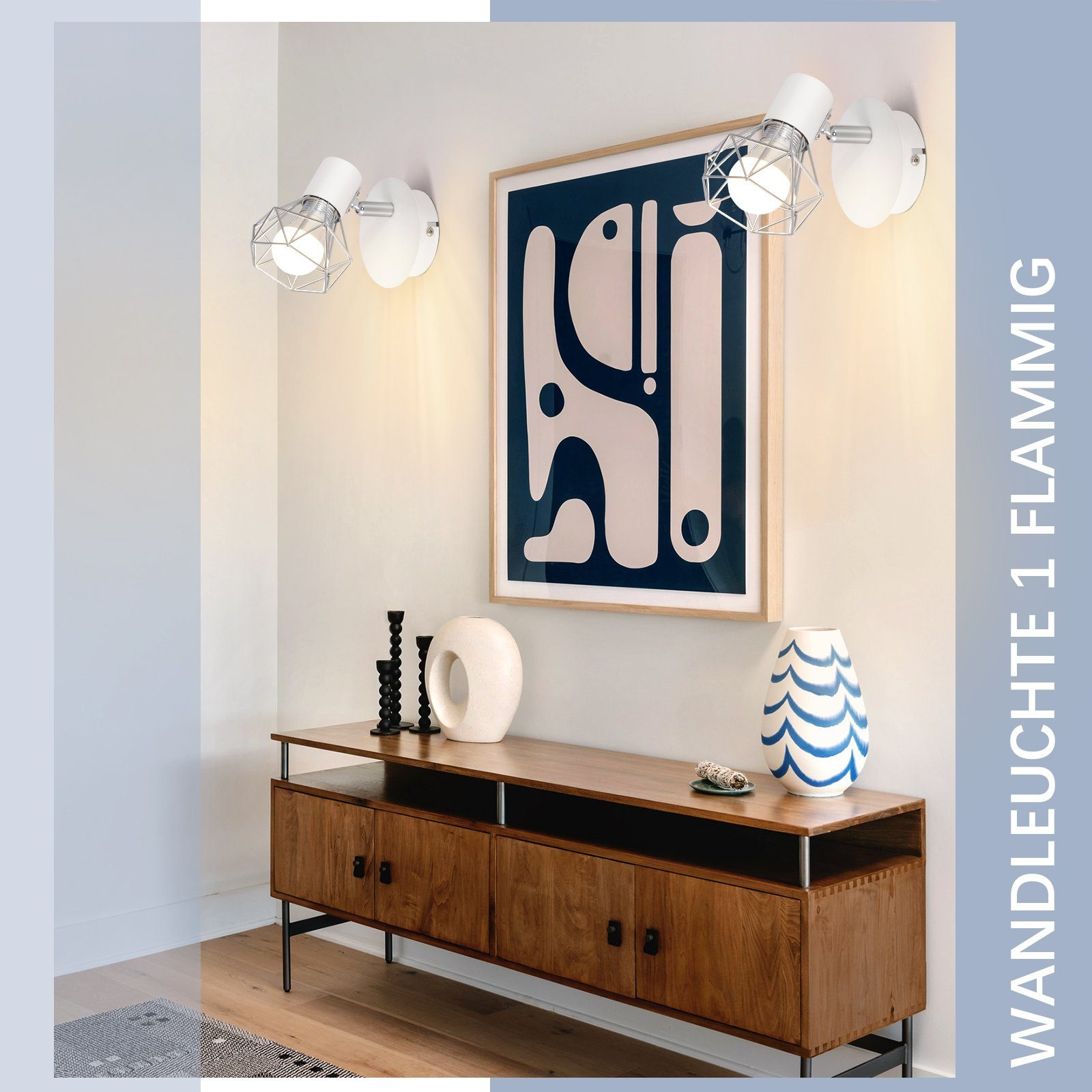 Dos lámparas de pared sobre un mueble de madera. Una pintura y objetos de decoración están en el mueble.